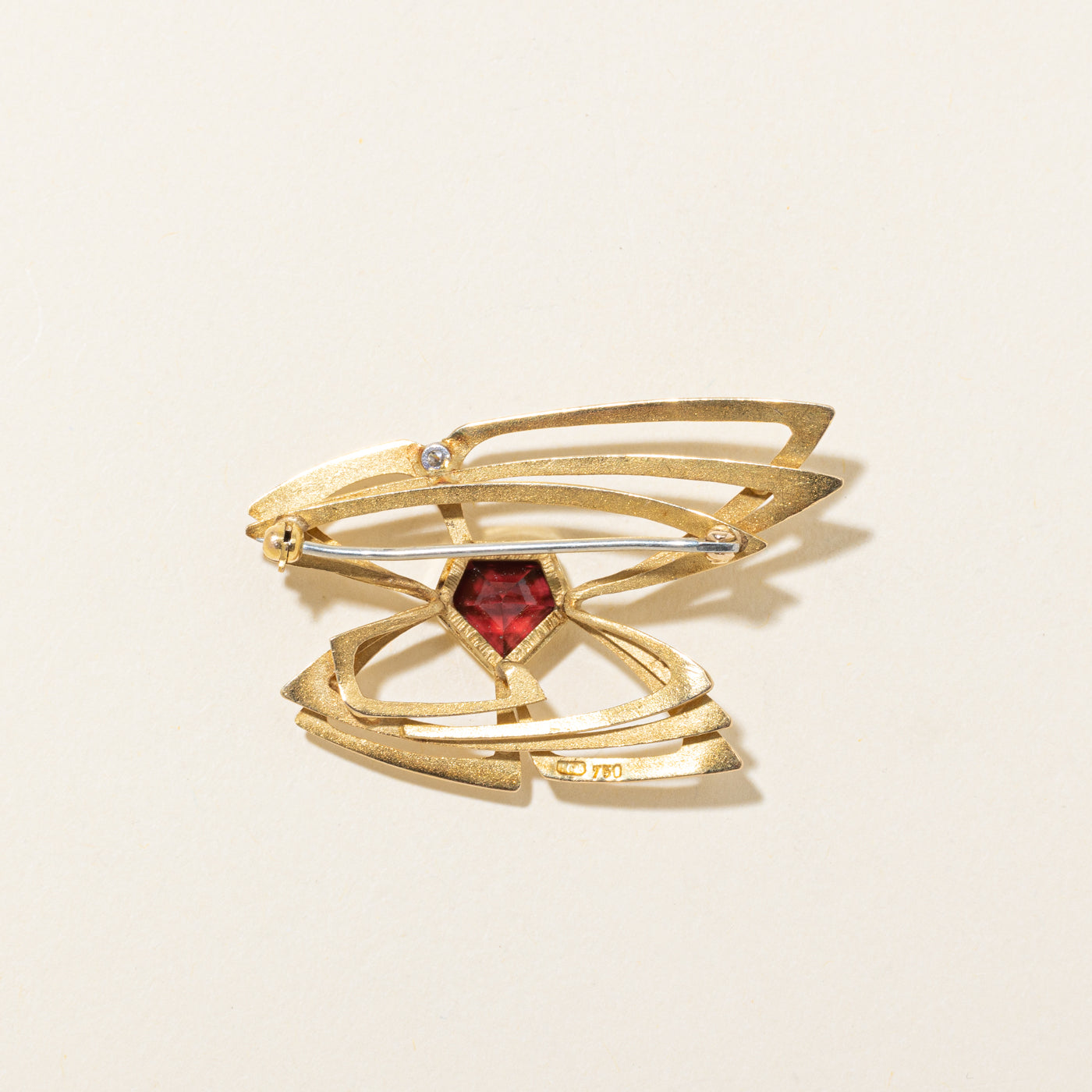 'Neil Carrick Aird' 1988 Garnet & Diamond Papillion Brooch | 2.75ct, 0.06ct