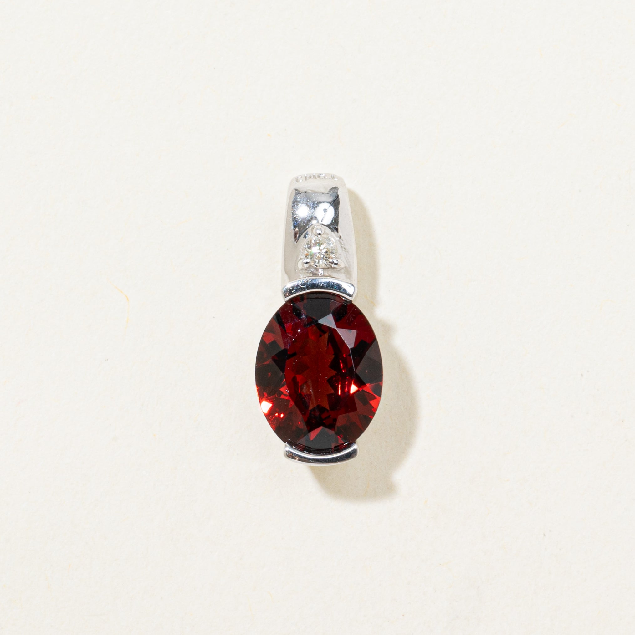Oval Cut Garnet & Diamond Pendant | 1.78ct, 0.02ct