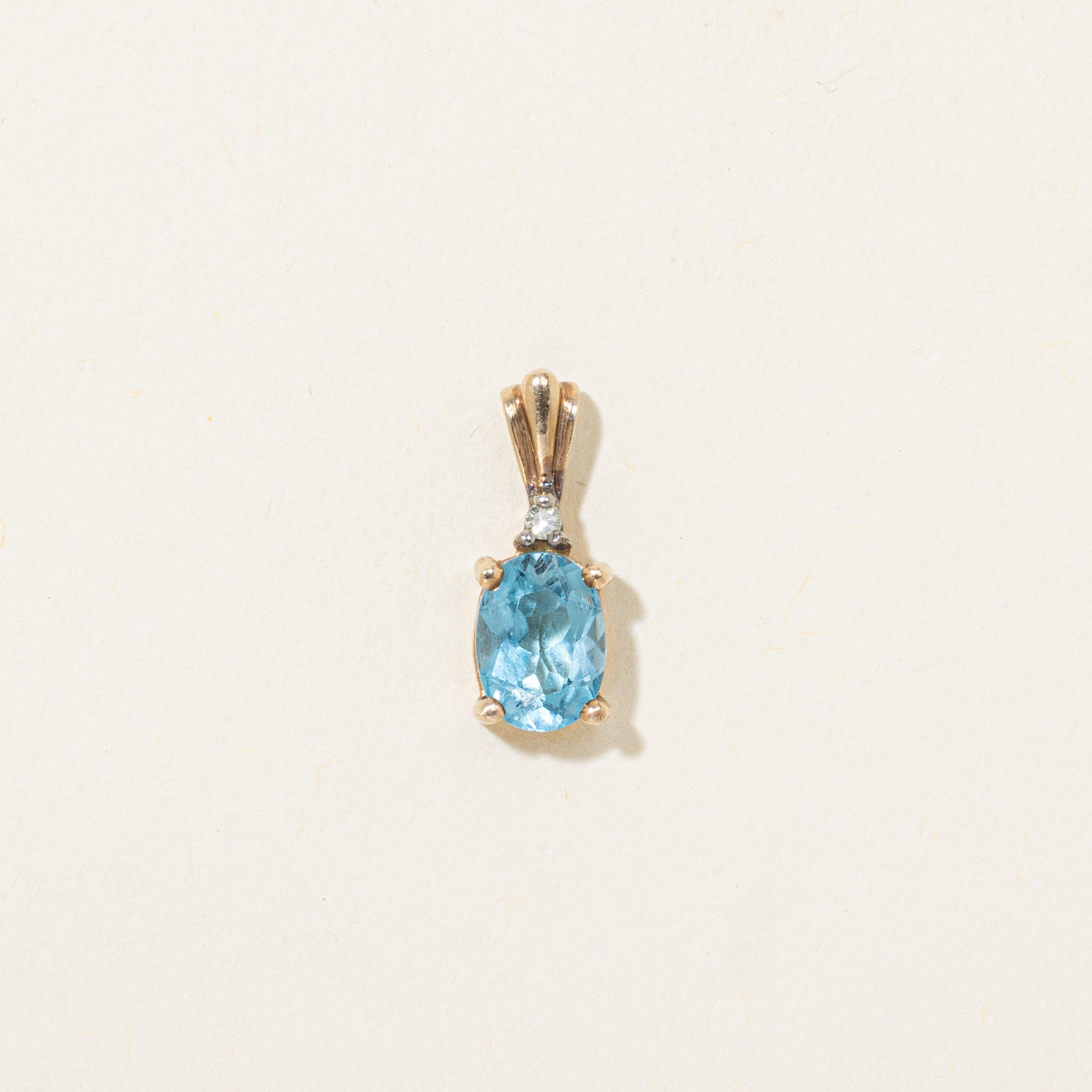 Oval Cut Blue Topaz & Diamond Pendant | 0.86ct, 0.01ct