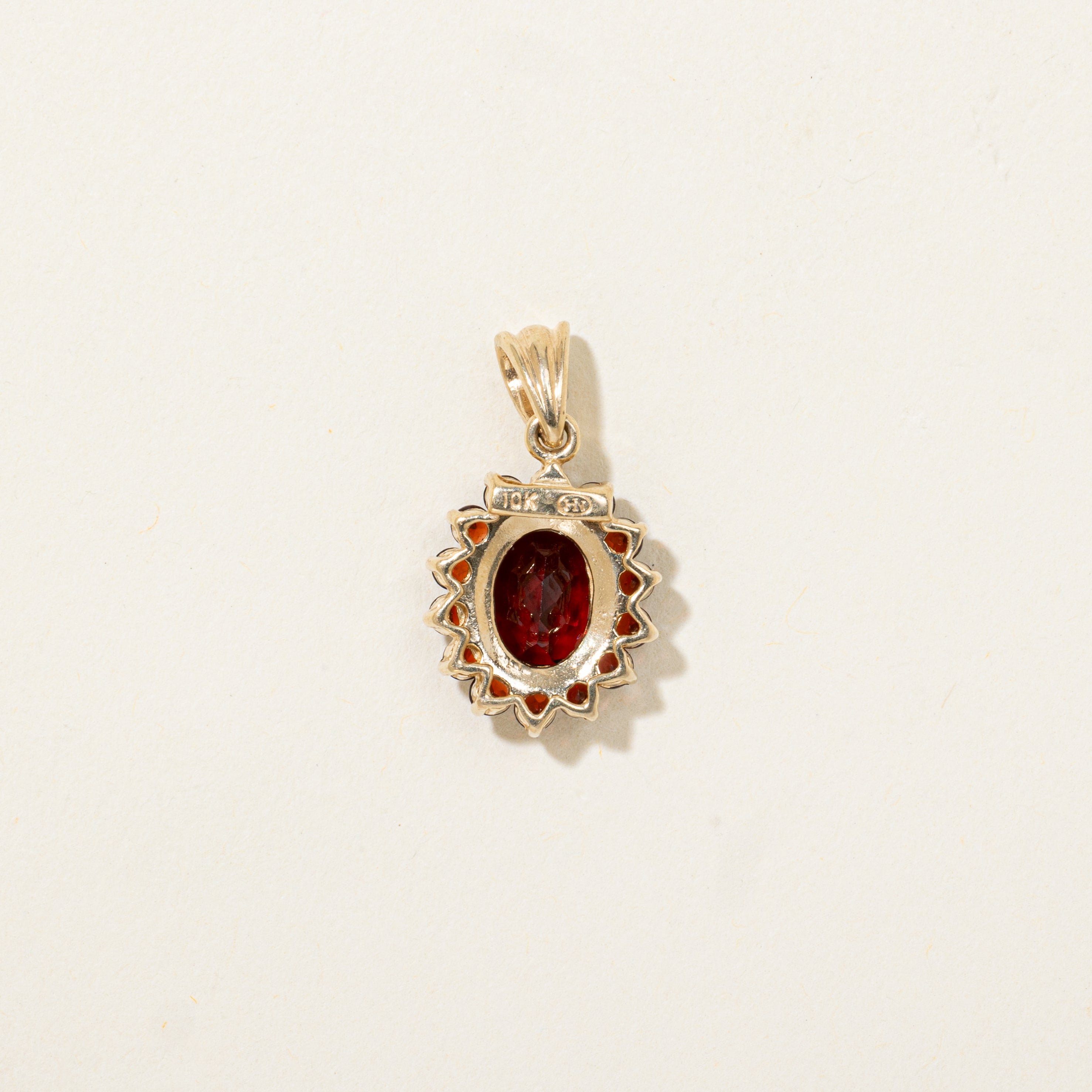 Oval Cut Garnet Halo Pendant | 1.63ctw