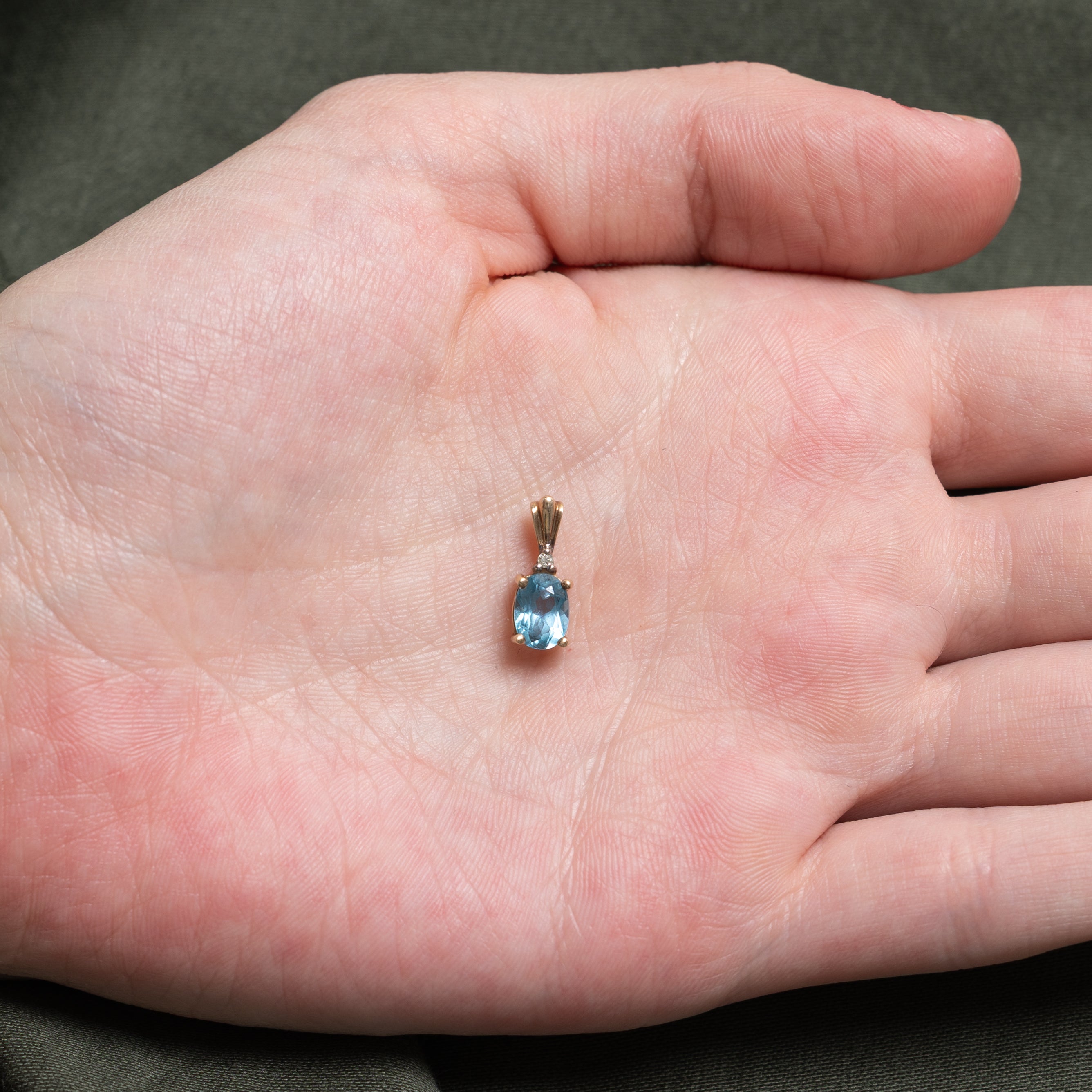 Oval Cut Blue Topaz & Diamond Pendant | 0.86ct, 0.01ct