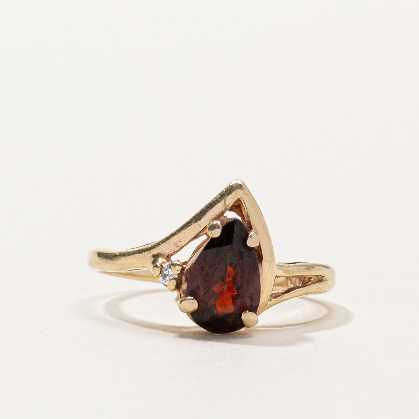 10k Pear Cut Garnet & Diamond Accented Ring | 0.90ct, 0.01ctw | SZ 4