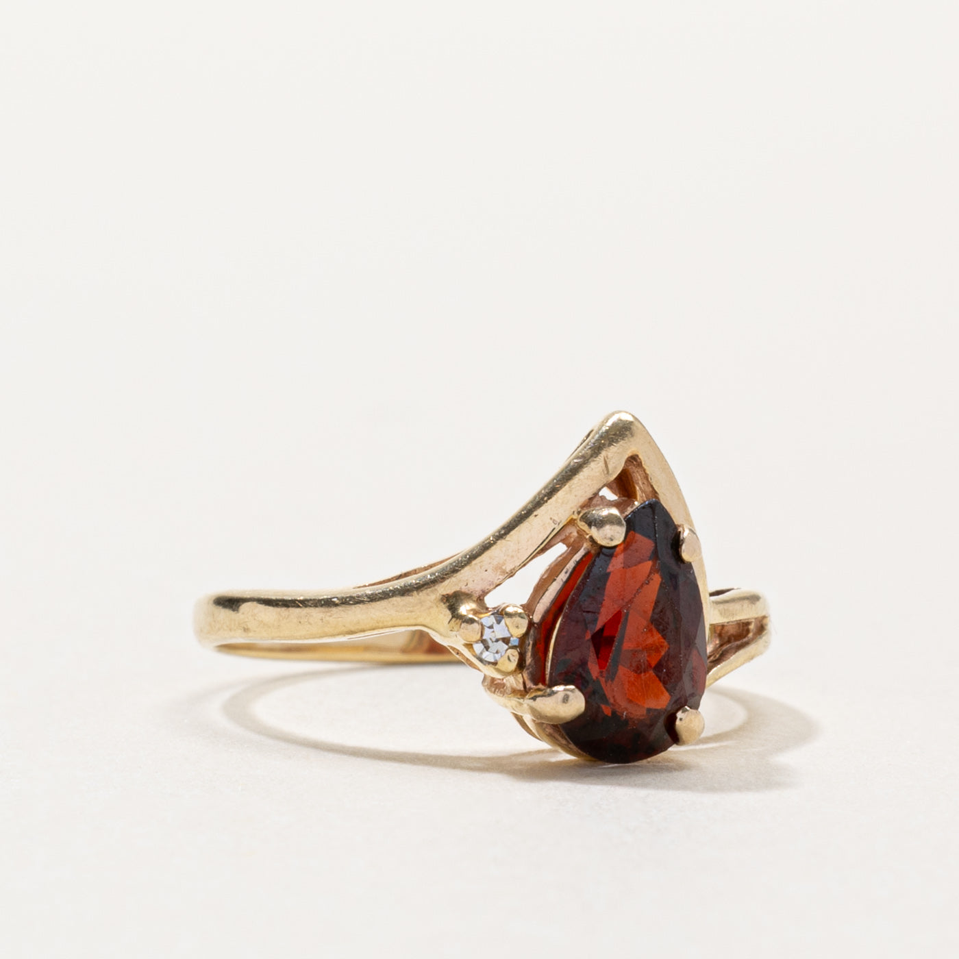 10k Pear Cut Garnet & Diamond Accented Ring | 0.90ct, 0.01ctw | SZ 4