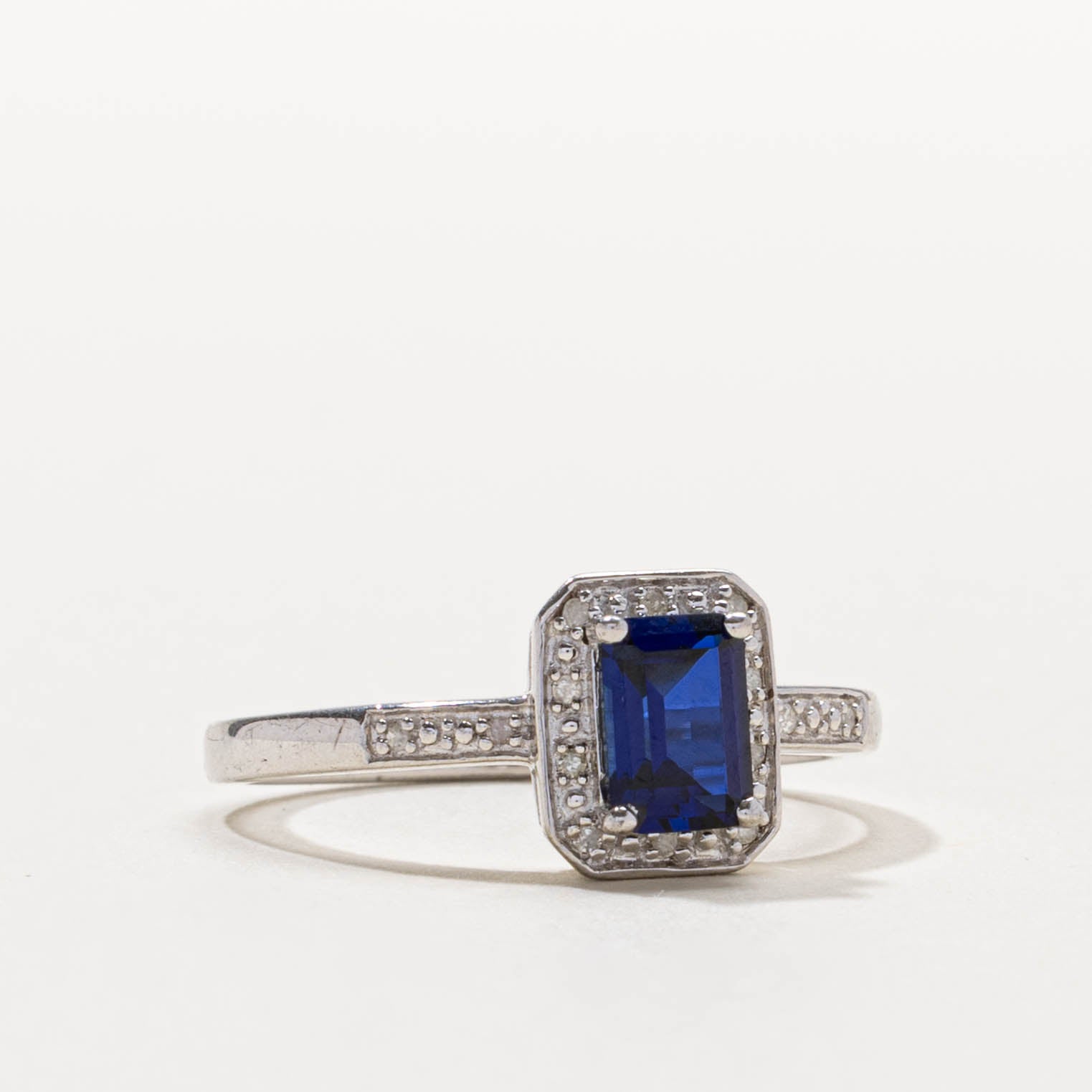 Sterling Silver Synthetic Sapphire & Natural Diamond Halo Ring | 1.00ct, 0.03ctw | SZ 9.75