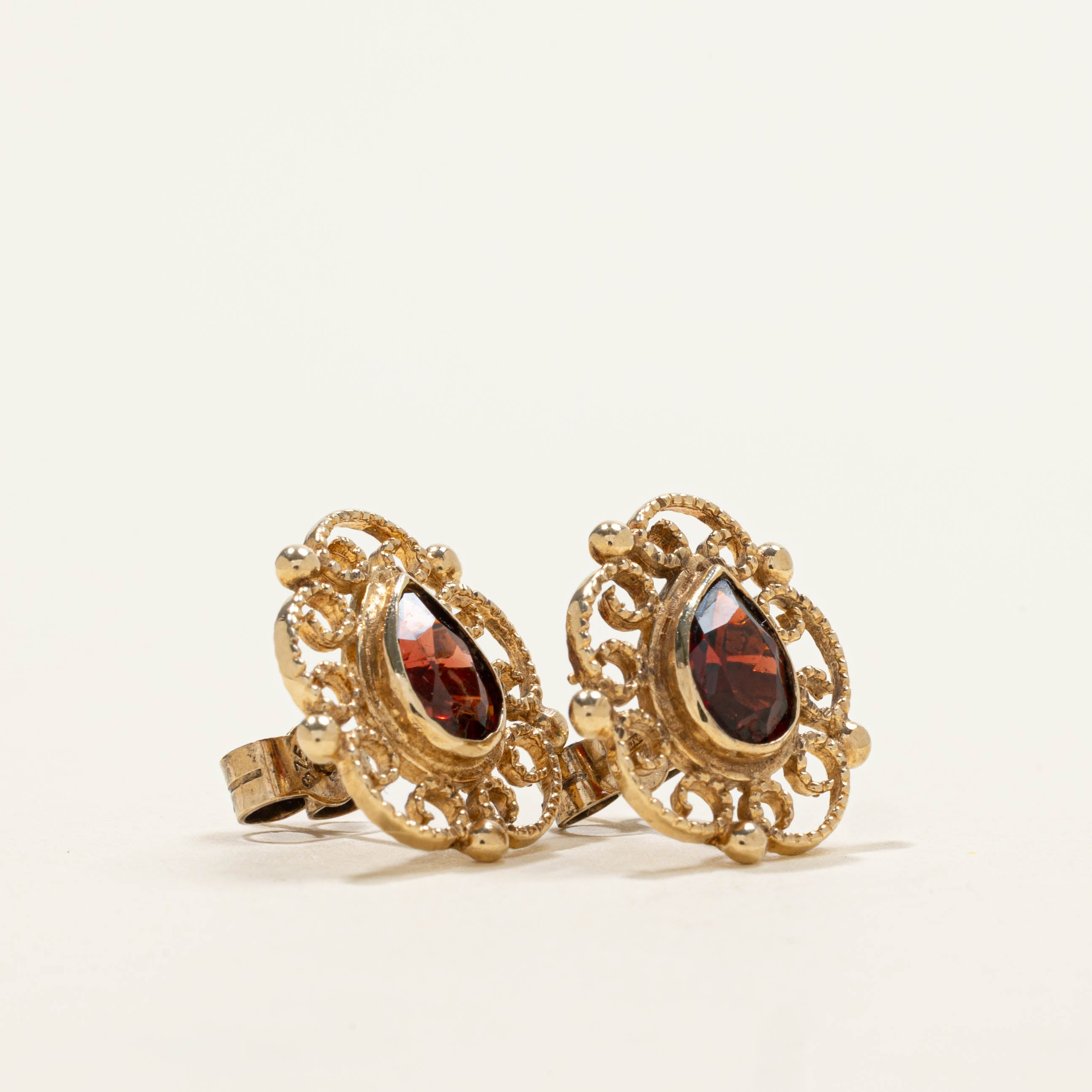 Birmingham 9k Garnet Ornate Stud Earrings | 1.20ctw