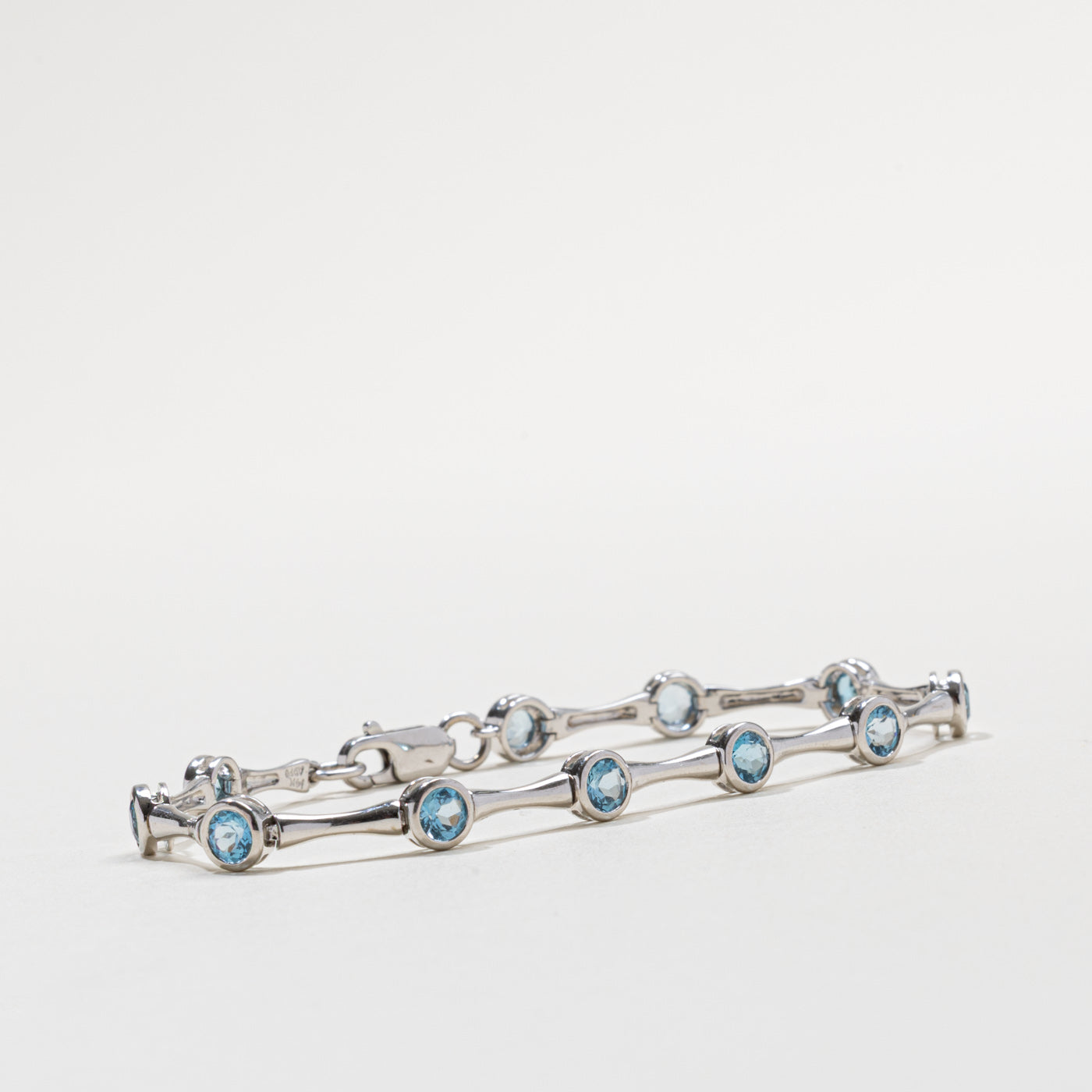14k Bezel Set Blue Topaz Bracelet | 3.30ctw