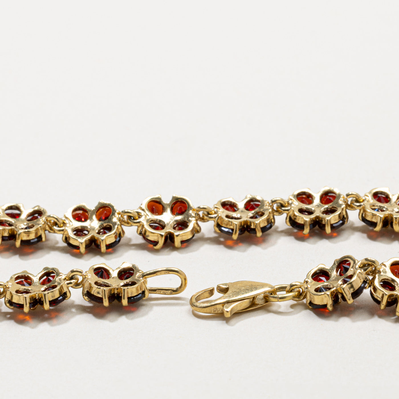 18k Garnet Floral Cluster Bracelet | 12.80ctw