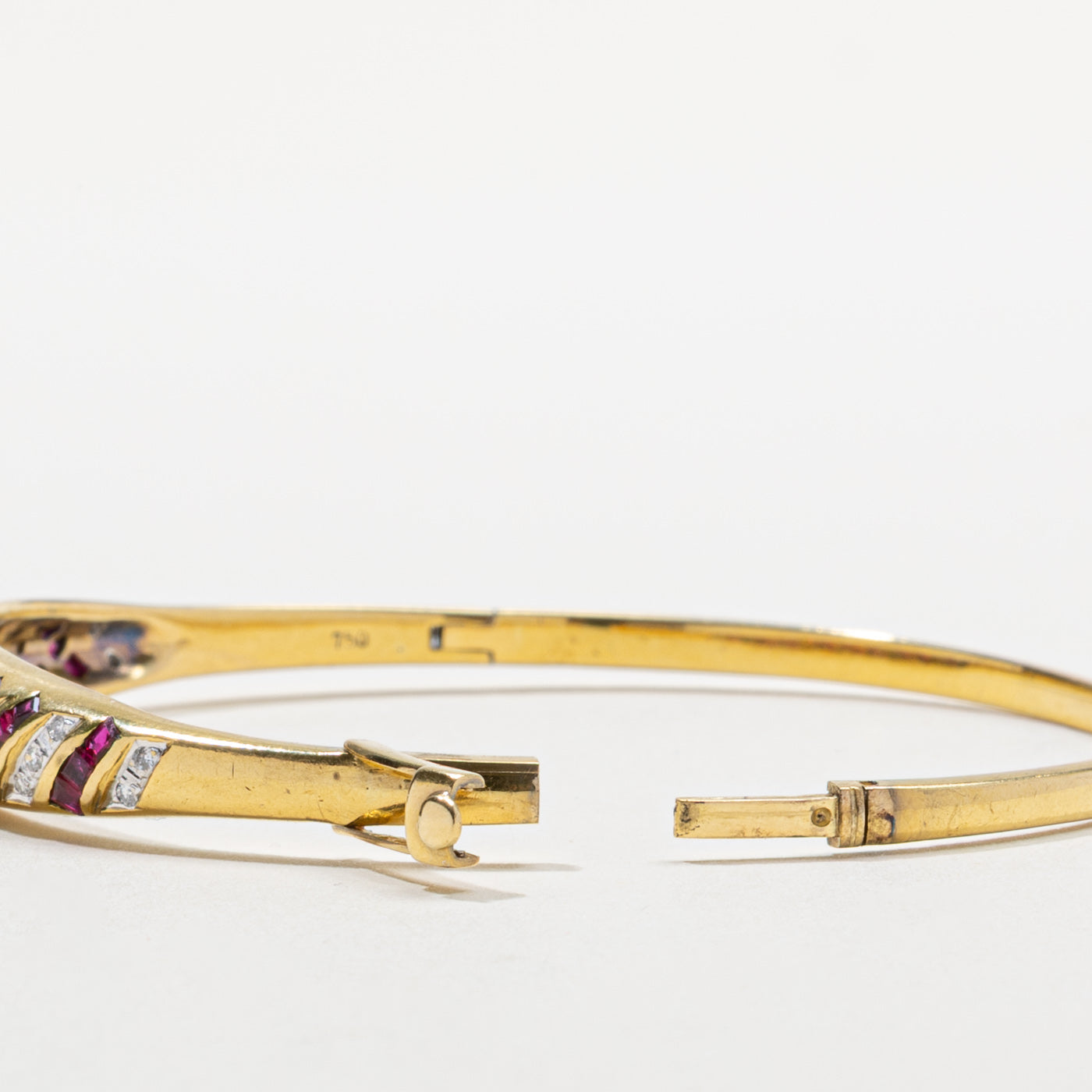 18k Ruby & Diamond Channel Set Bangle Bracelet | 1.30ctw, 0.09ctw