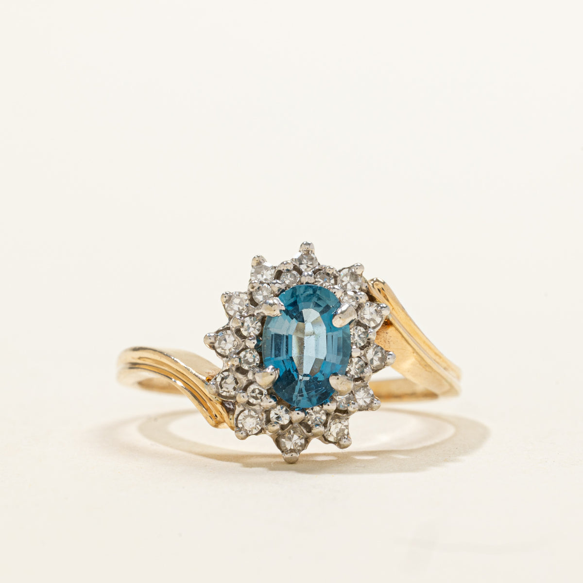 14k Oval Cut Blue Topaz & Diamond Petal Halo Bypass Ring | 0.95ct, 0.18ctw | SZ 8.25