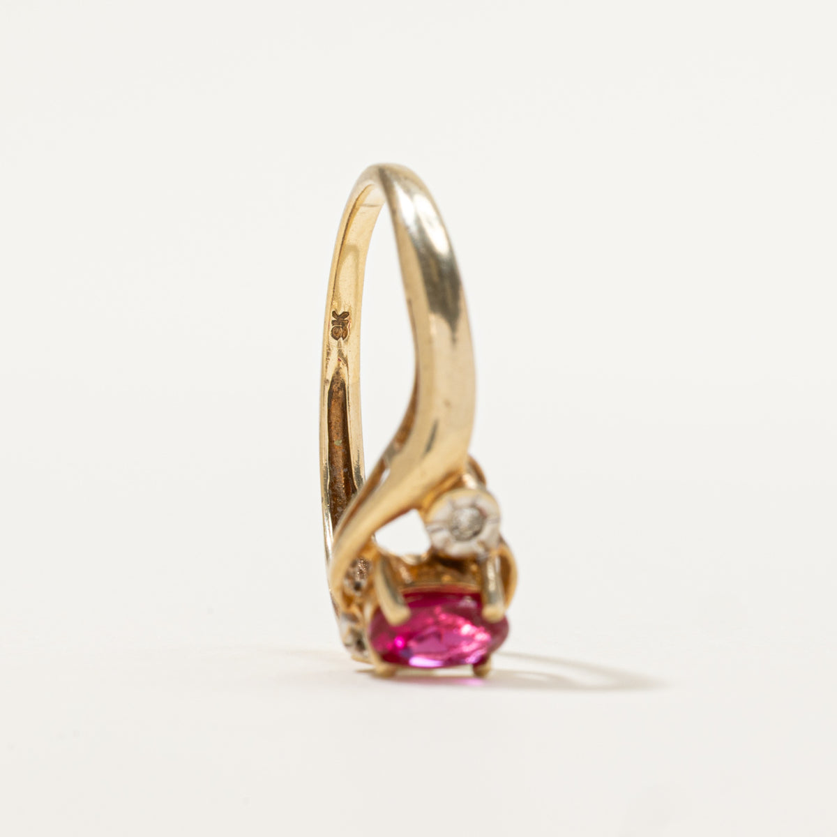 9k Oval Cut Synthetic Ruby & Diamond Bypass Ring | 0.50ct, 0.02ctw | SZ 6.5