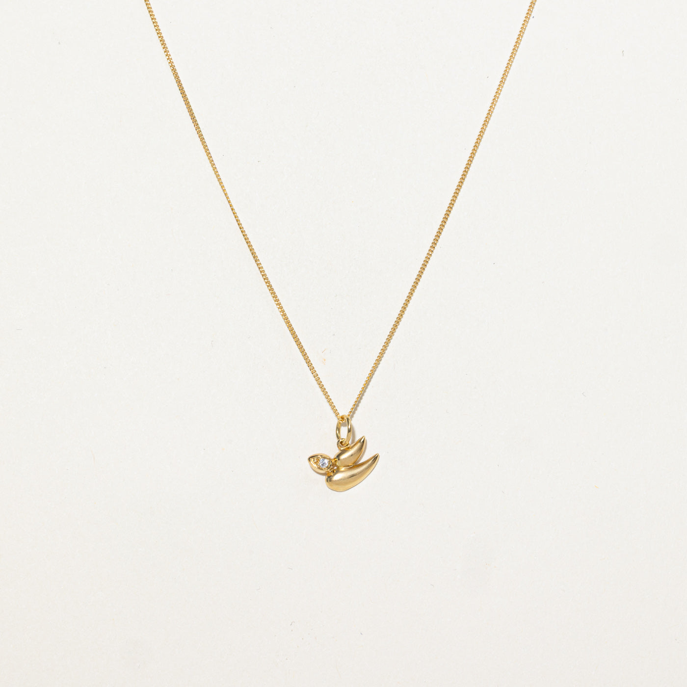 Collier pendentif oiseau abstrait en diamant 18 carats | 47 cm