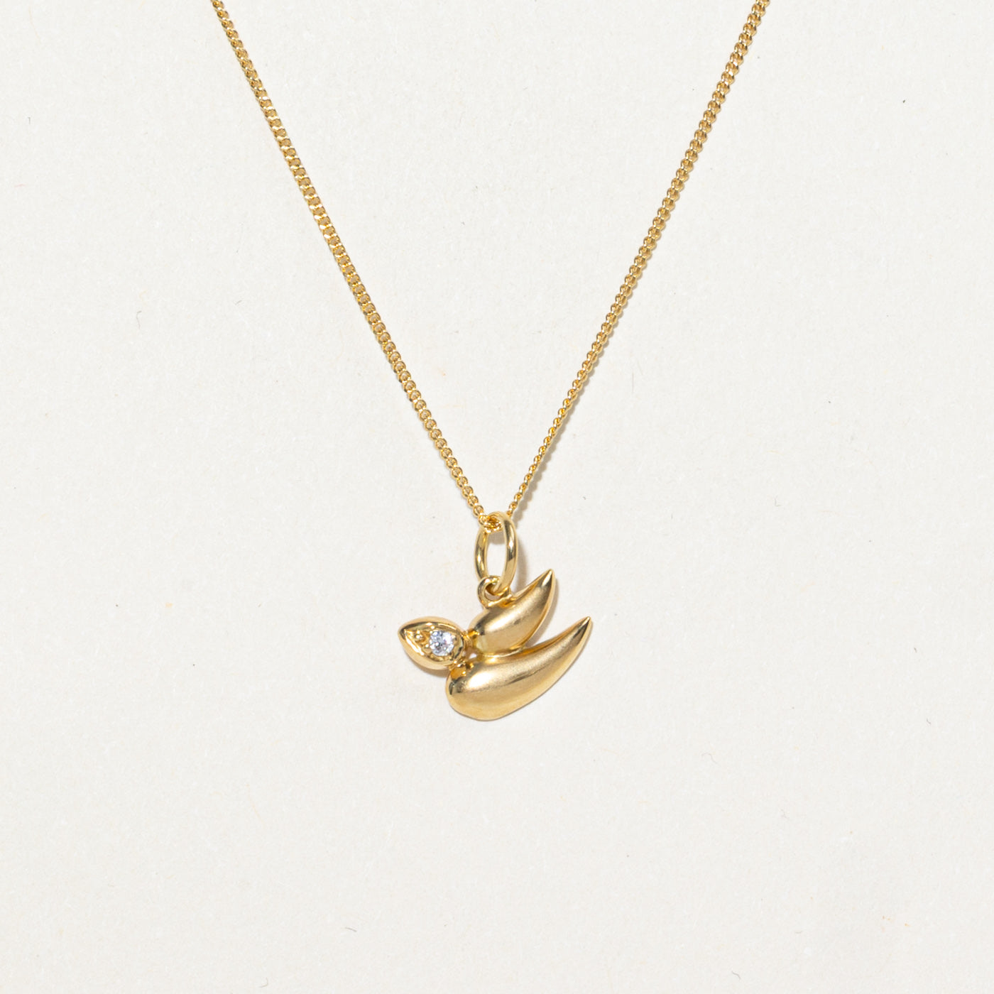 Collier pendentif oiseau abstrait en diamant 18 carats | 47 cm