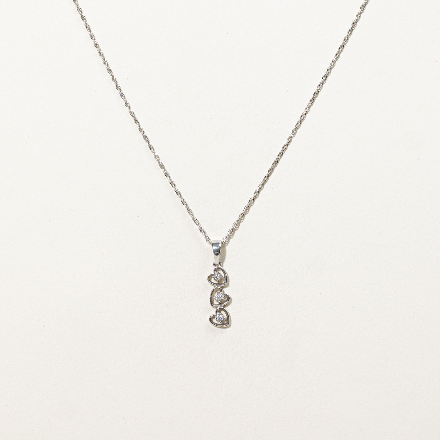 10K Diamond Triple Heart Pendant Necklace | 18"
