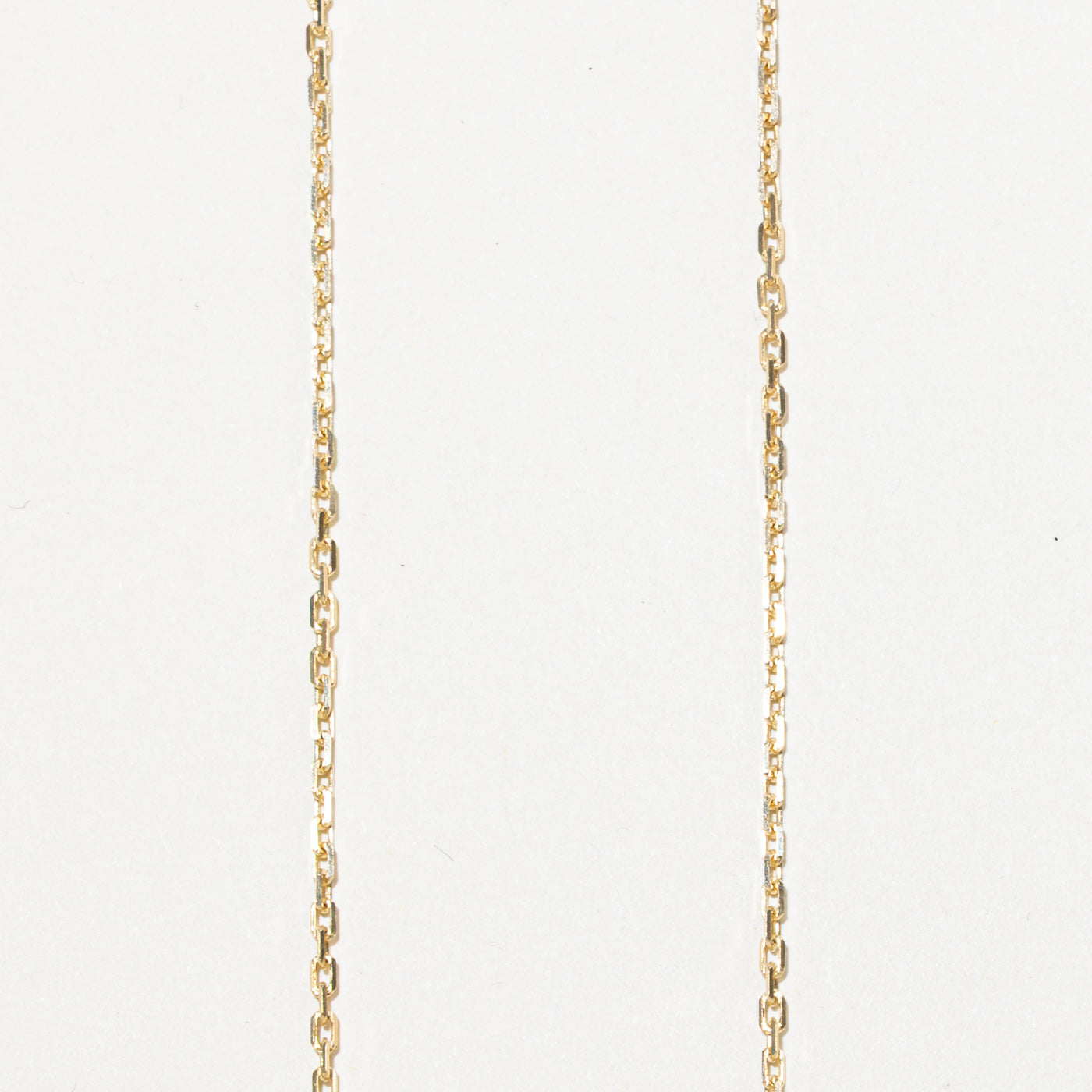 10K Diamond Twist Cross Pendant Necklace | 16"