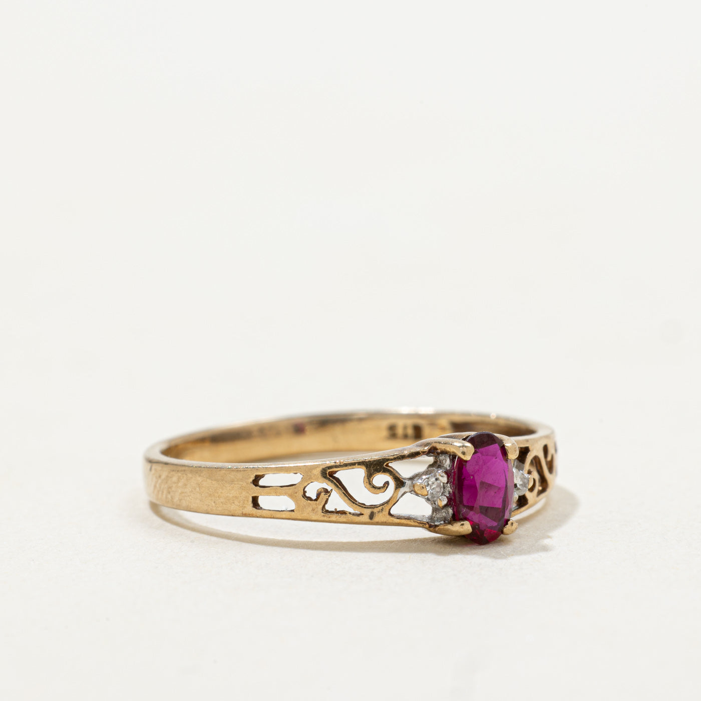 9k Oval Cut Synthetic Ruby & Diamond Accented Scrollwork Ring | SZ 6.75