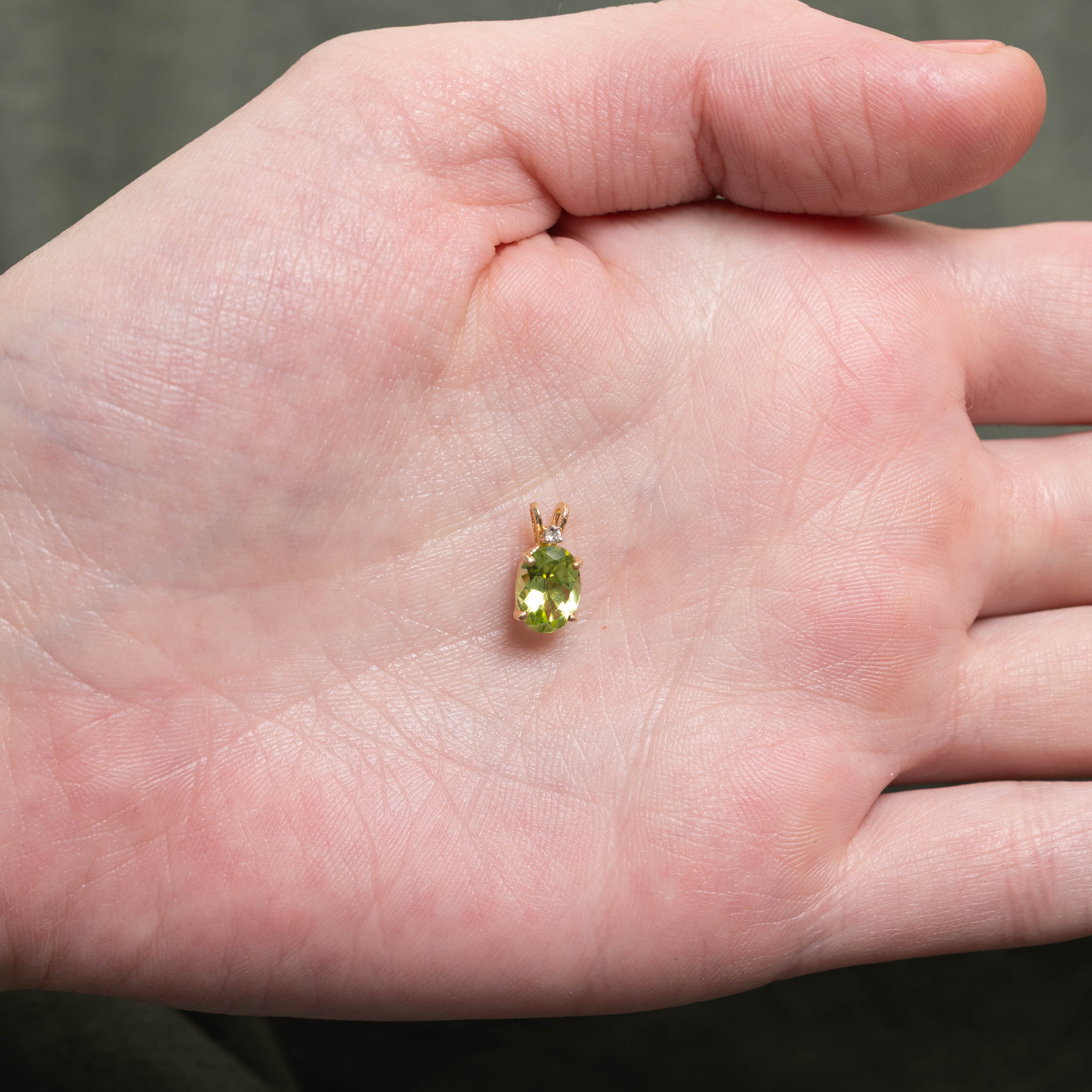 14k Oval Cut Peridot & Diamond Pendant | 1.20ct, 0.01ctw