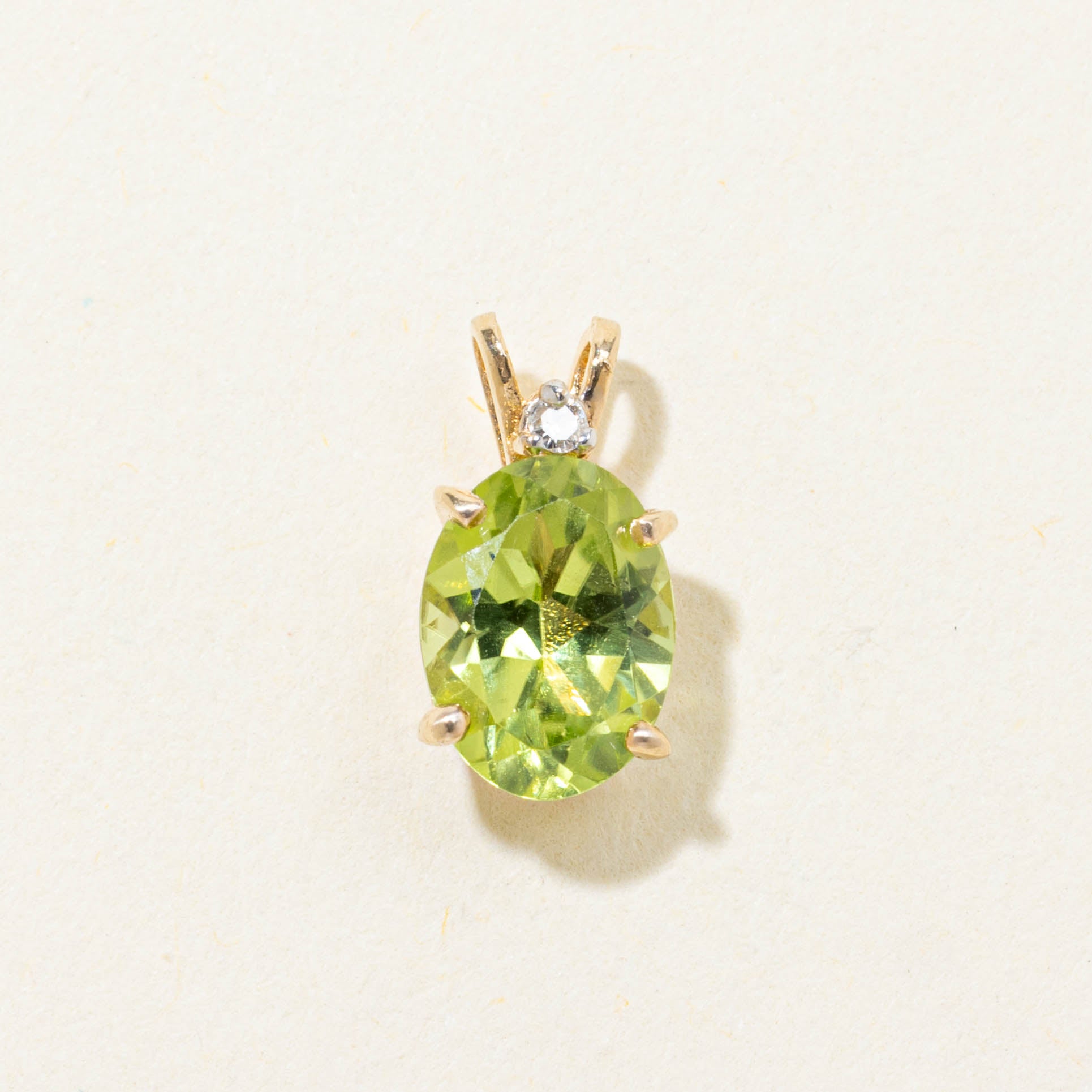 14k Oval Cut Peridot & Diamond Pendant | 1.20ct, 0.01ctw