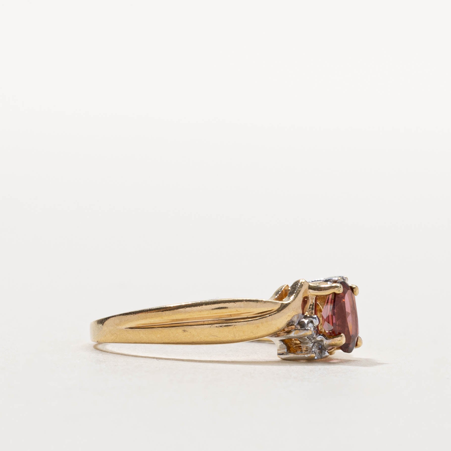 10k Garnet & Diamond Accented Crossover Ring | 0.50ct, 0.04ctw | SZ 7.75