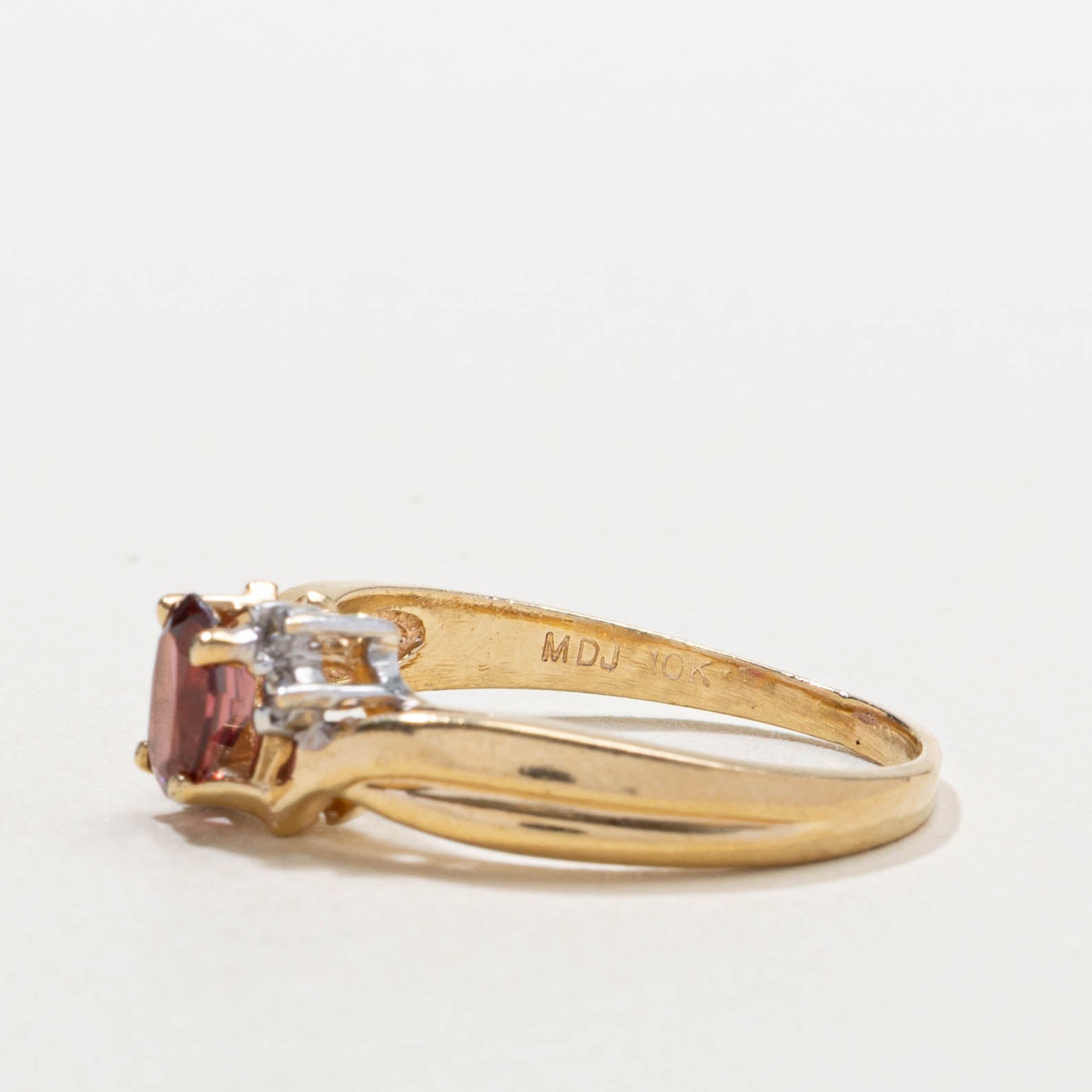 10k Garnet & Diamond Accented Crossover Ring | 0.50ct, 0.04ctw | SZ 7.75