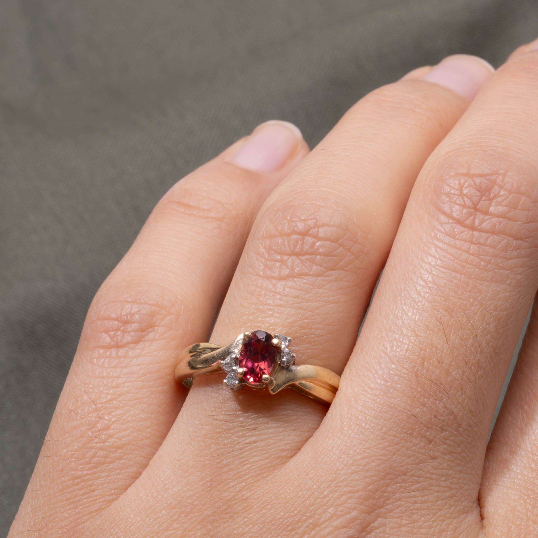 10k Garnet & Diamond Accented Crossover Ring | 0.50ct, 0.04ctw | SZ 7.75