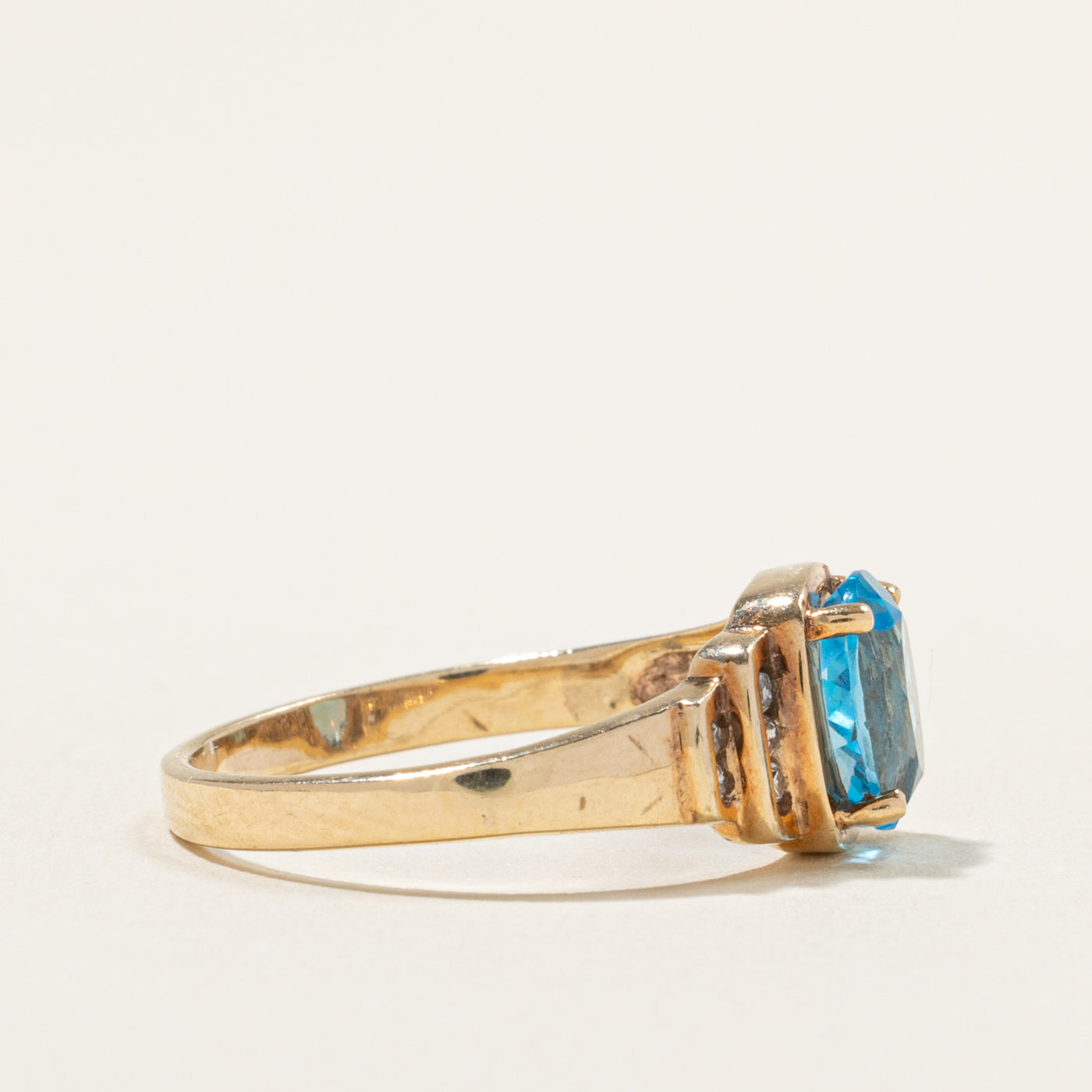 10k Blue Topaz & Channel Set Diamond Accented Ring | 2.00ct, 0.10ctw | SZ 9.5