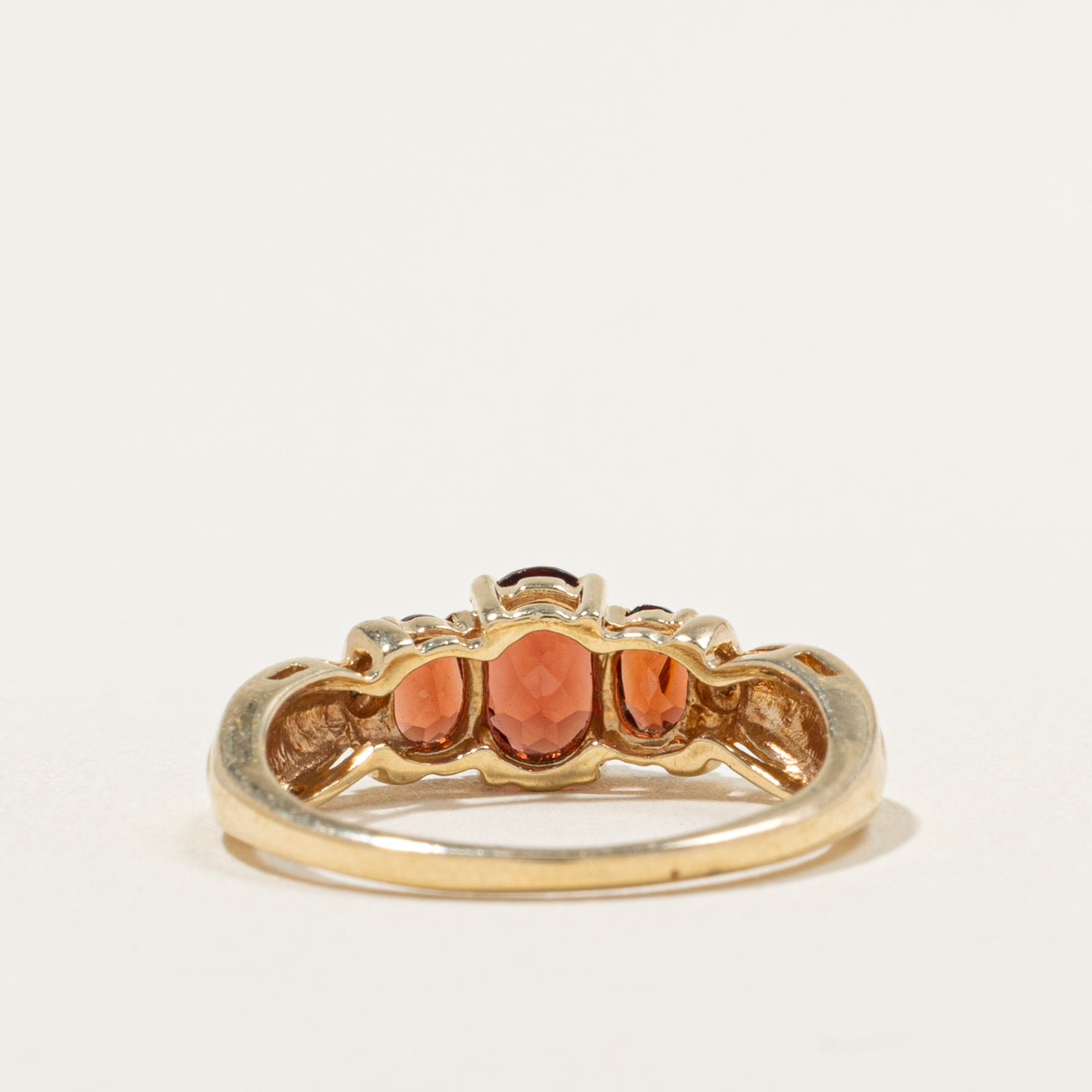 10k Three Stone Garnet & Diamond Accented Grooved Ring | 1.50ctw, 0.01ctw | SZ 8