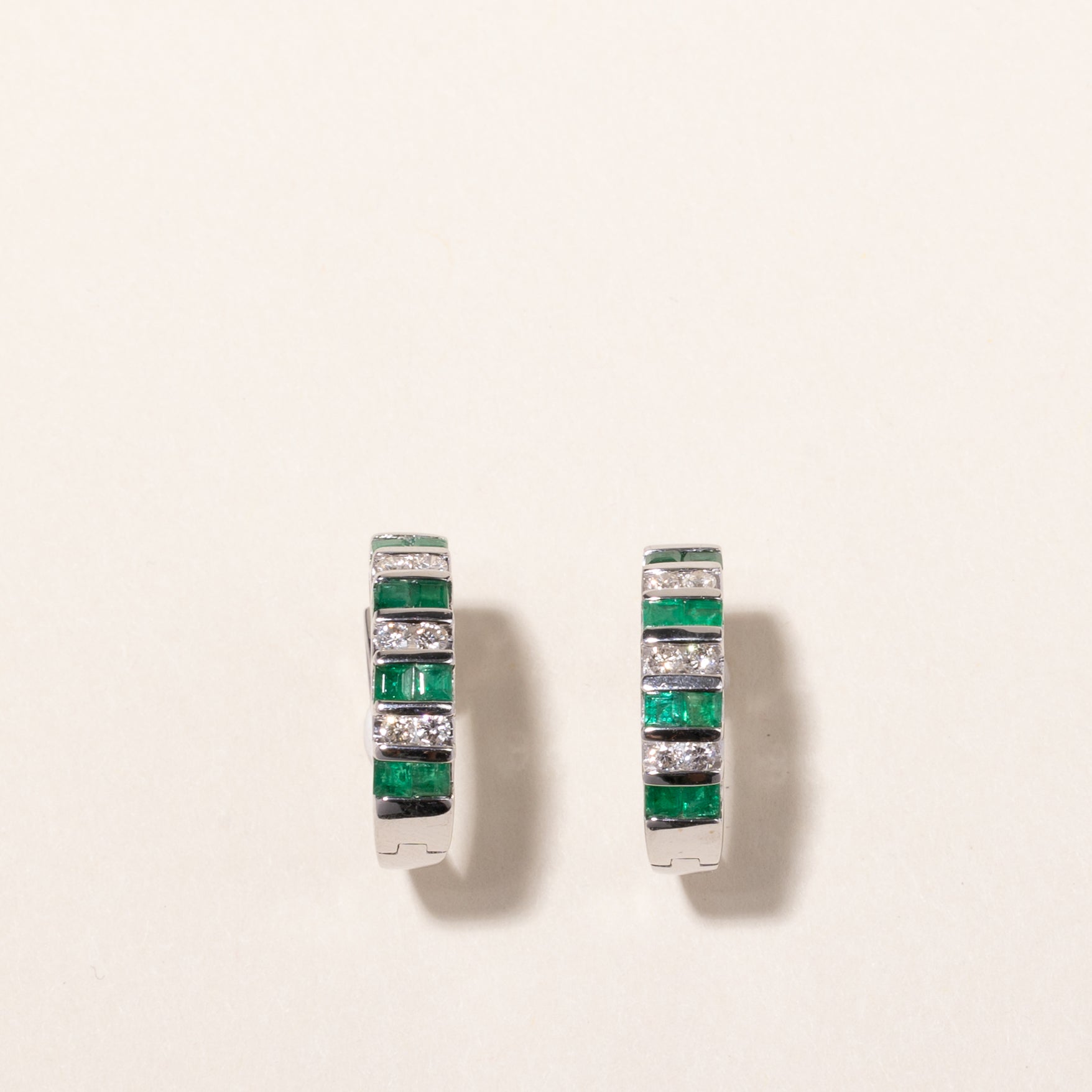 14k White Gold Emerald and Diamond Huggie Earrings | 1.07ctw, 0.43ctw | 2x2cm