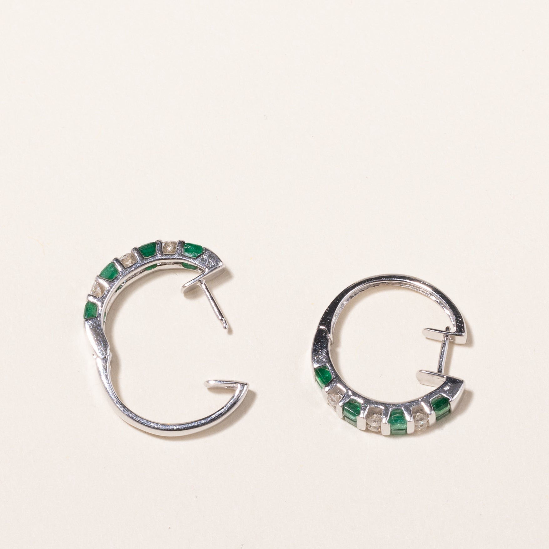 14k White Gold Emerald and Diamond Huggie Earrings | 1.07ctw, 0.43ctw | 2x2cm