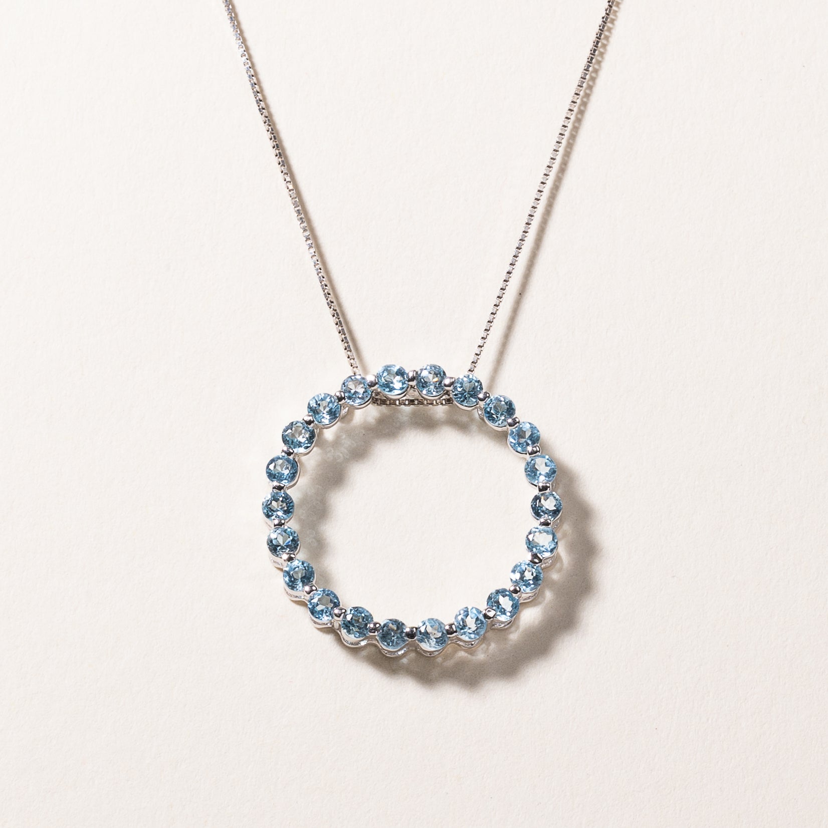 10k White Gold Circle Blue Topaz Pendant Necklace | 1.18ctw | 18"