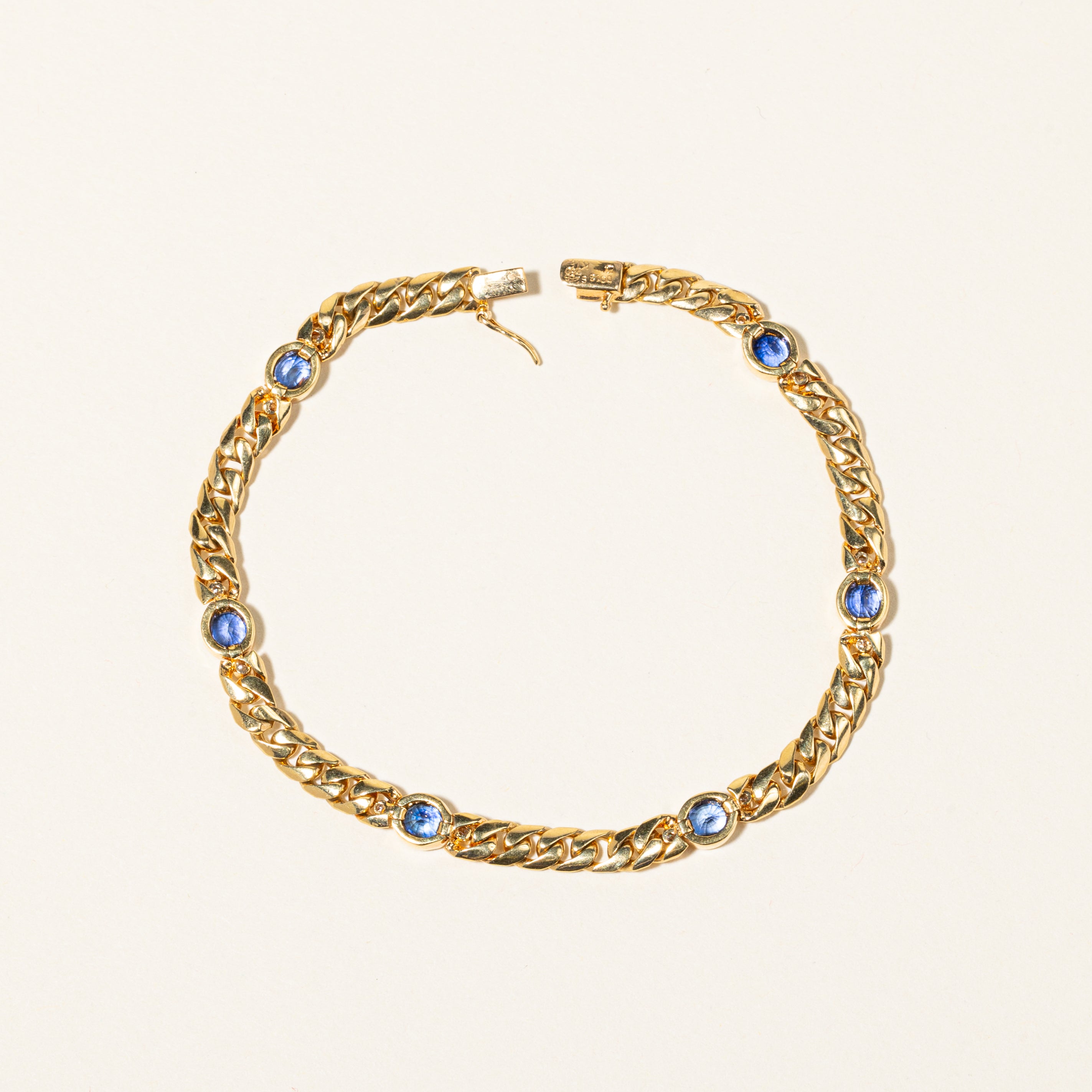 Bracelet en or jaune 18 carats serti de diamants et de saphirs | 0,13 ct au total, 2,58 ct au total | 18,4 cm 