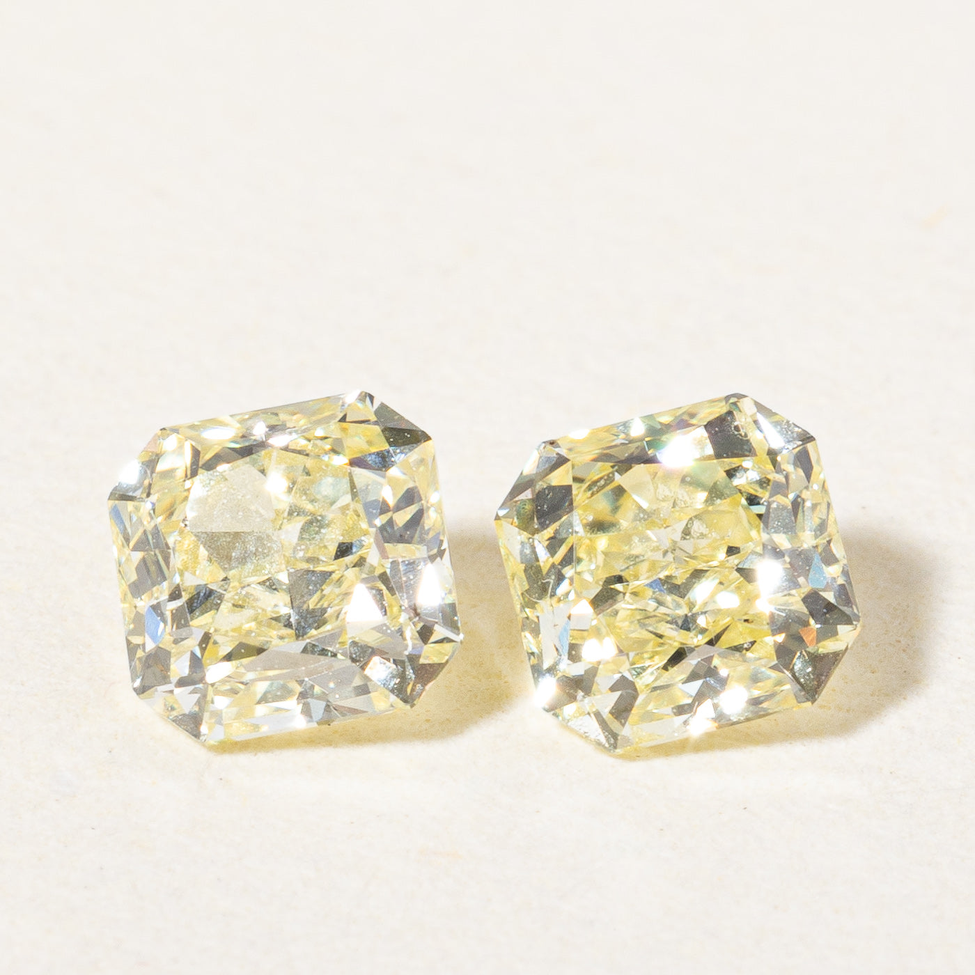 Radiant Cut Loose Fancy Yellow Diamond Pair | 0.66ctw VS1 Fancy Yellow |