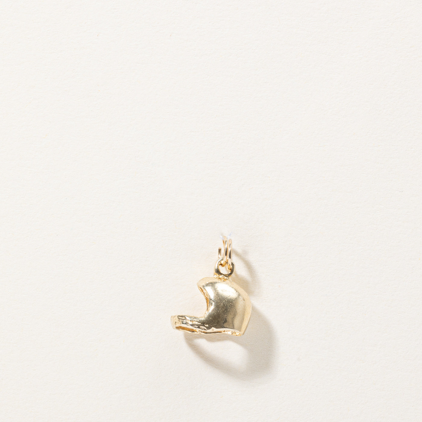 Breloque casque en or jaune 10 carats