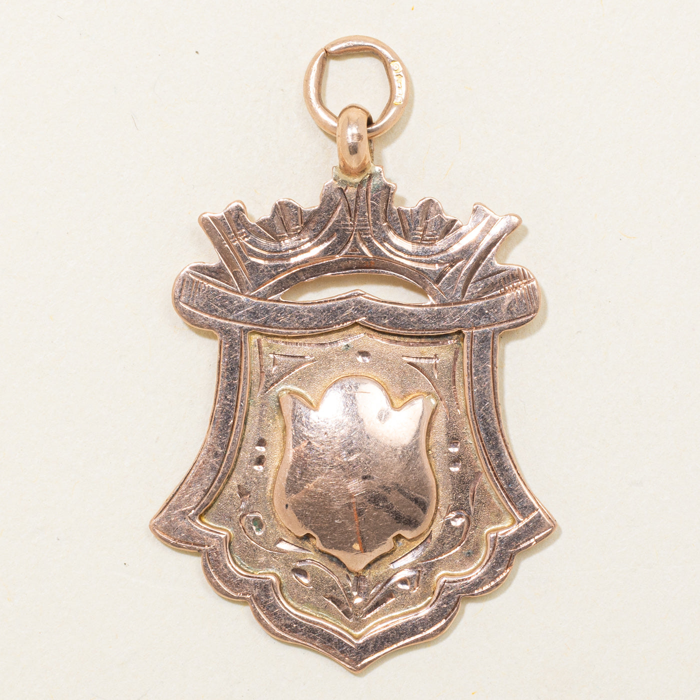 1924 Chester 9K Rose Gold Crest Pendant