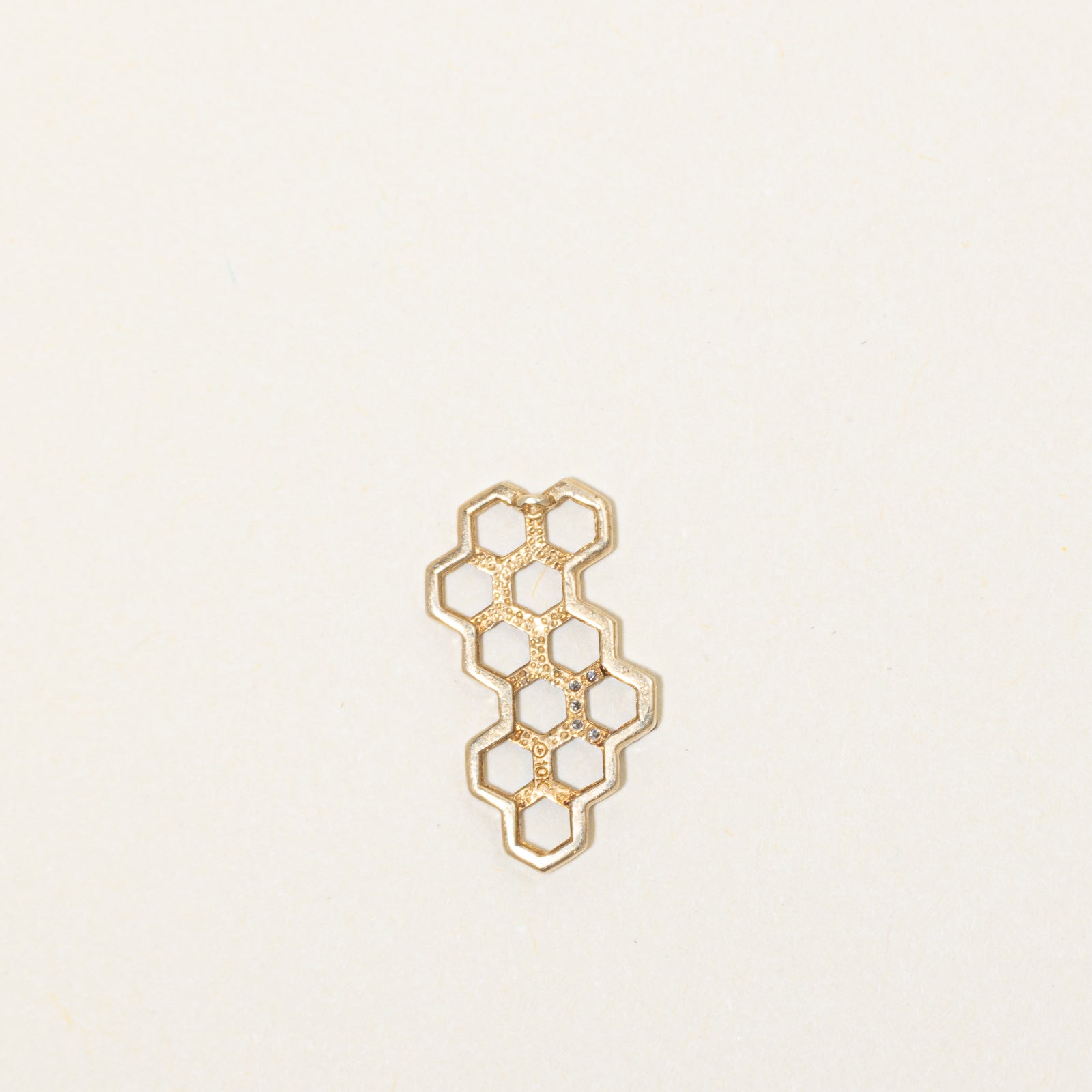 Pendentif nid d'abeille en diamants | 0,02 ct