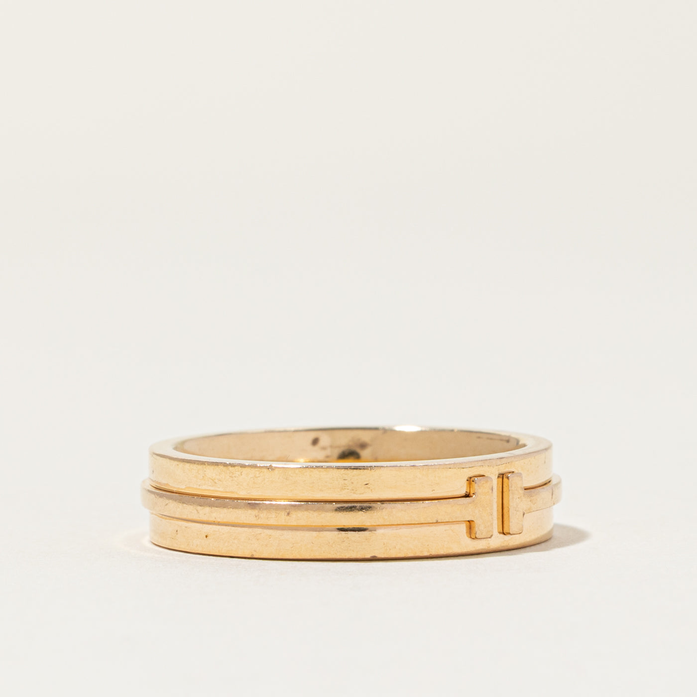 Bague large Tiffany T de Tiffany & Co en or jaune | 5,5 mm | Taille 10,5