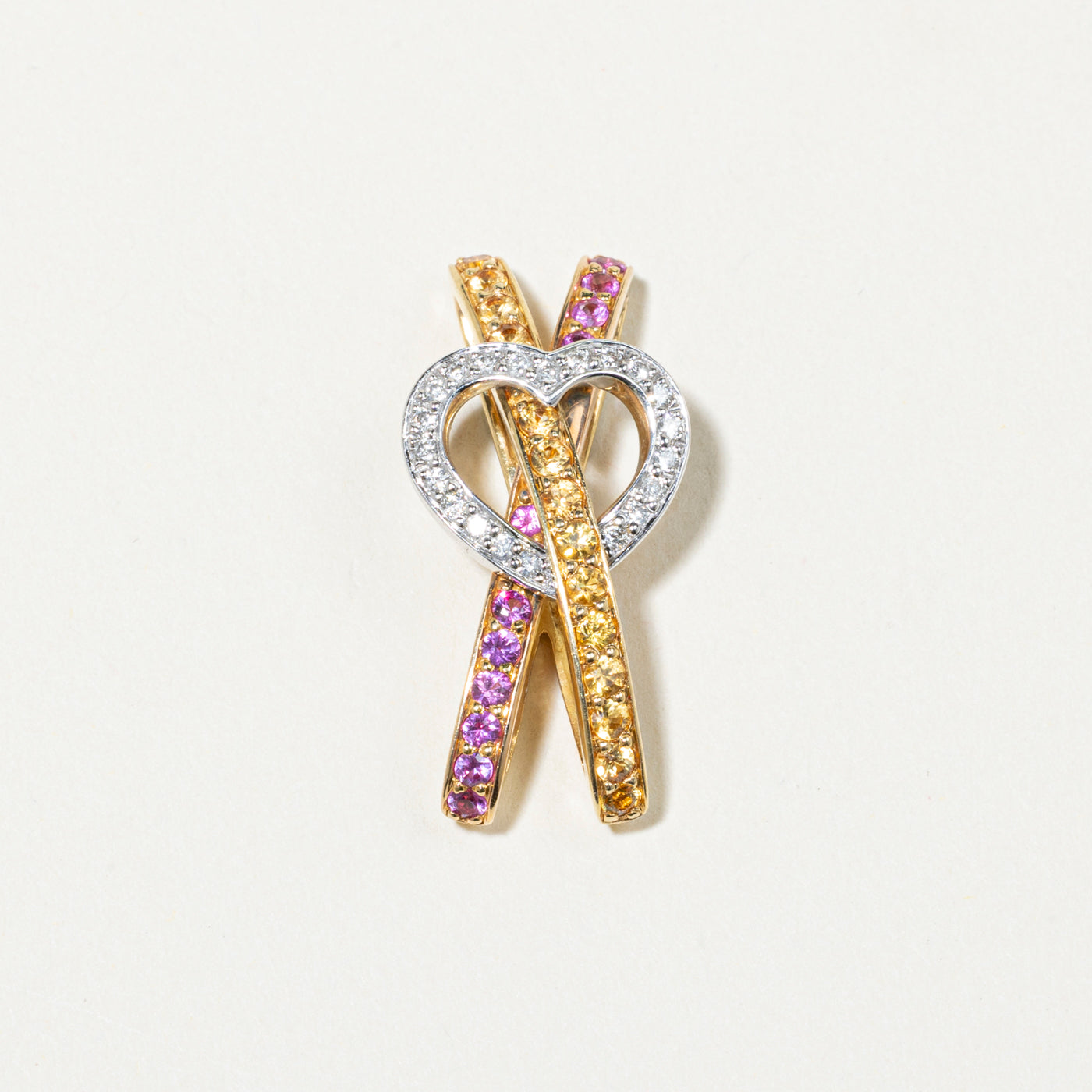 18k Yellow & Pink Sapphire & Diamond Heart Cross Over Pendant | 0.73ctw, 0.17ctw