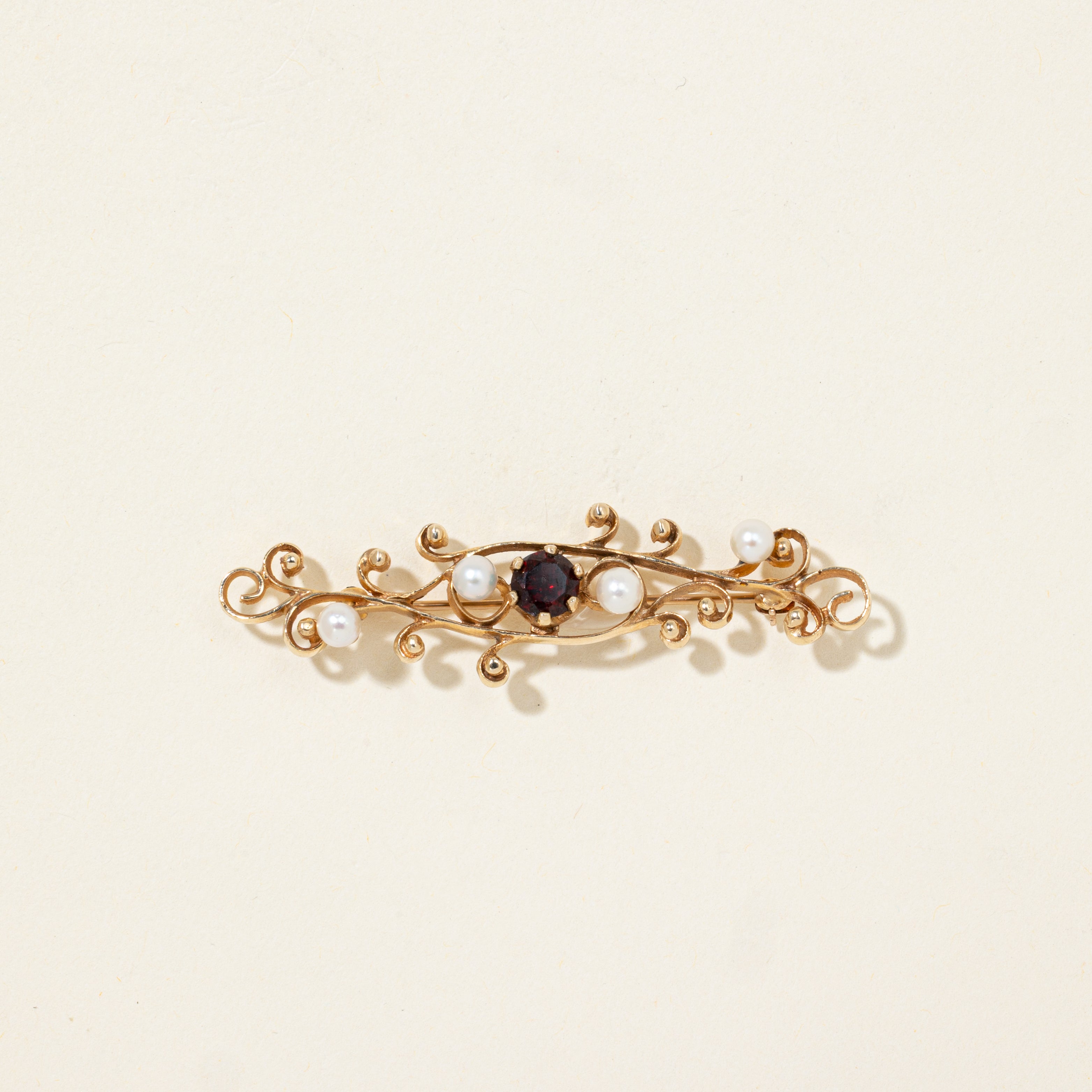 Garnet & Pearl Scrollwork Brooch | 0.72ctw
