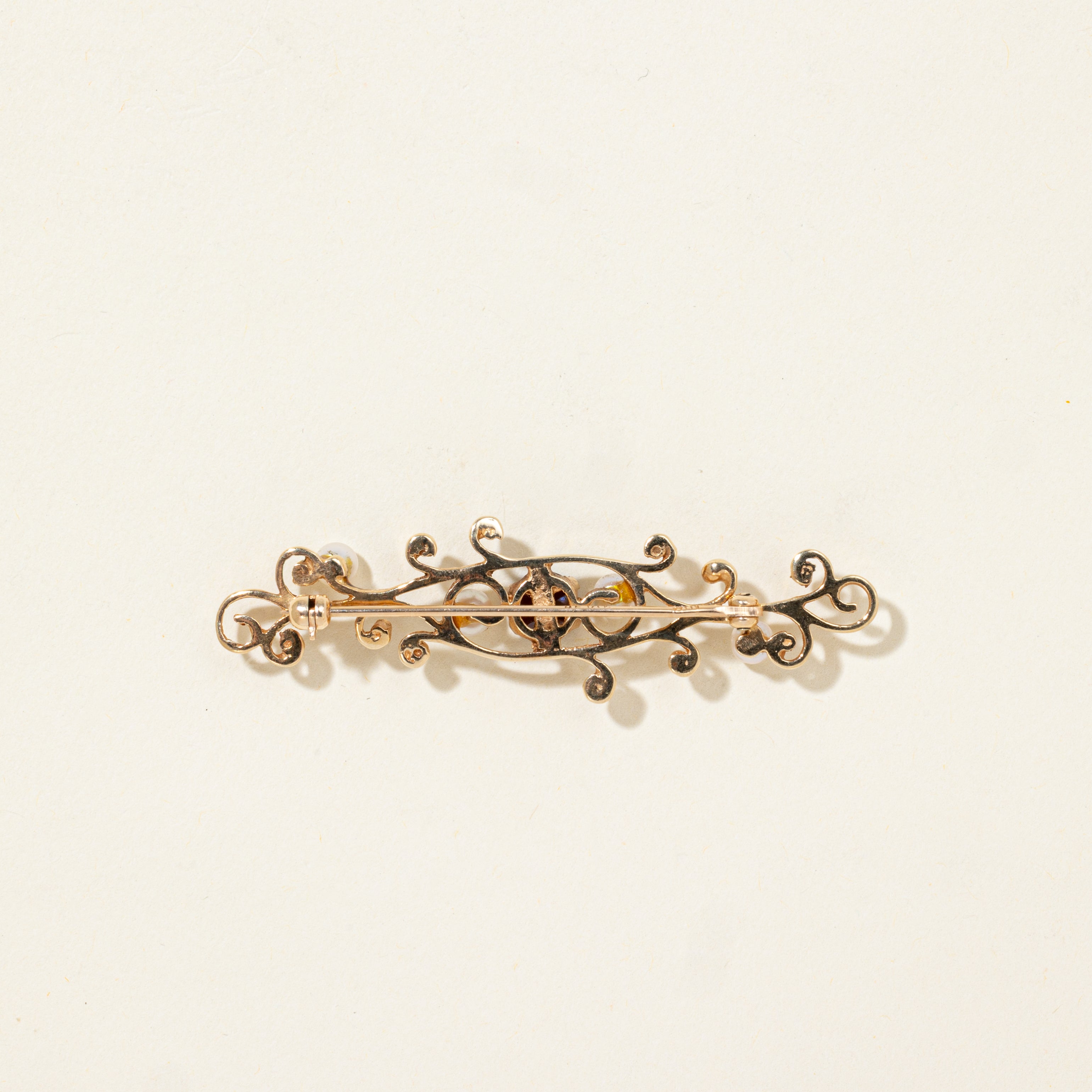 Garnet & Pearl Scrollwork Brooch | 0.72ctw