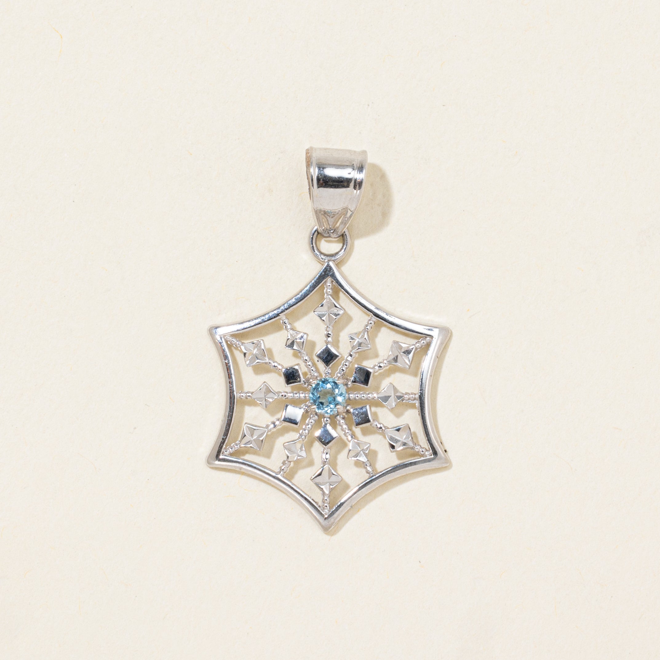 White Gold Blue Topaz Snowflake Pendant | 0.10ct