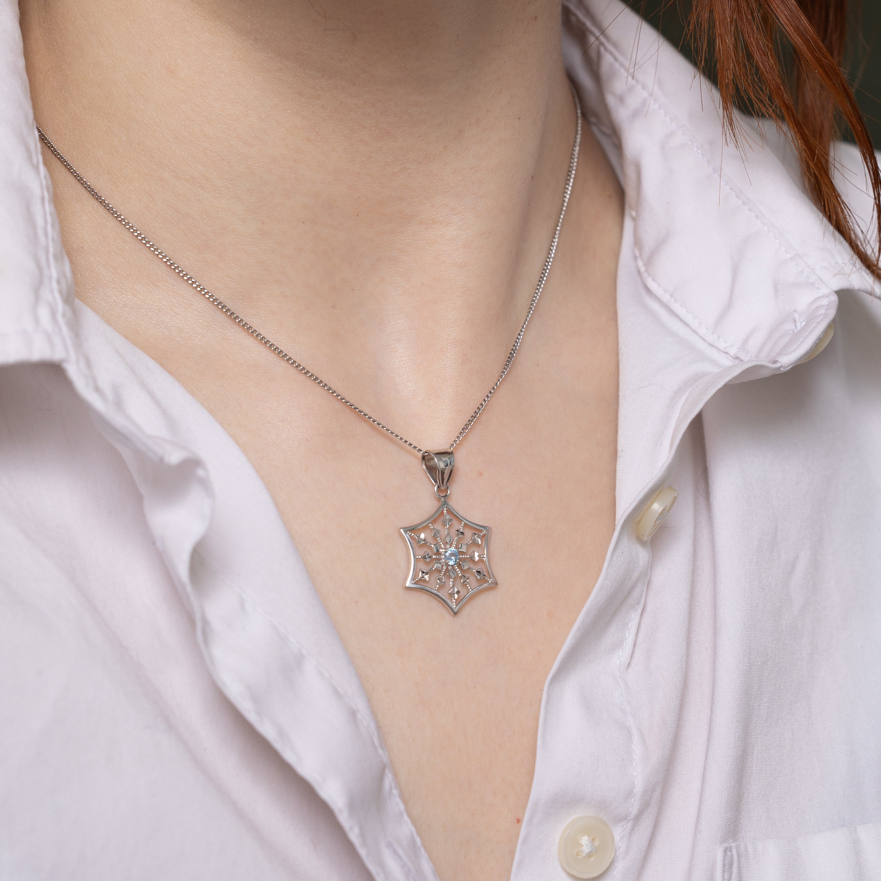 White Gold Blue Topaz Snowflake Pendant | 0.10ct