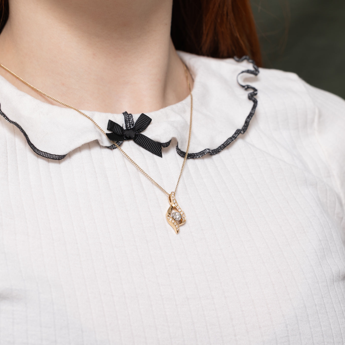 Illusion Set Diamond Swirl Pendant | 0.24ctw