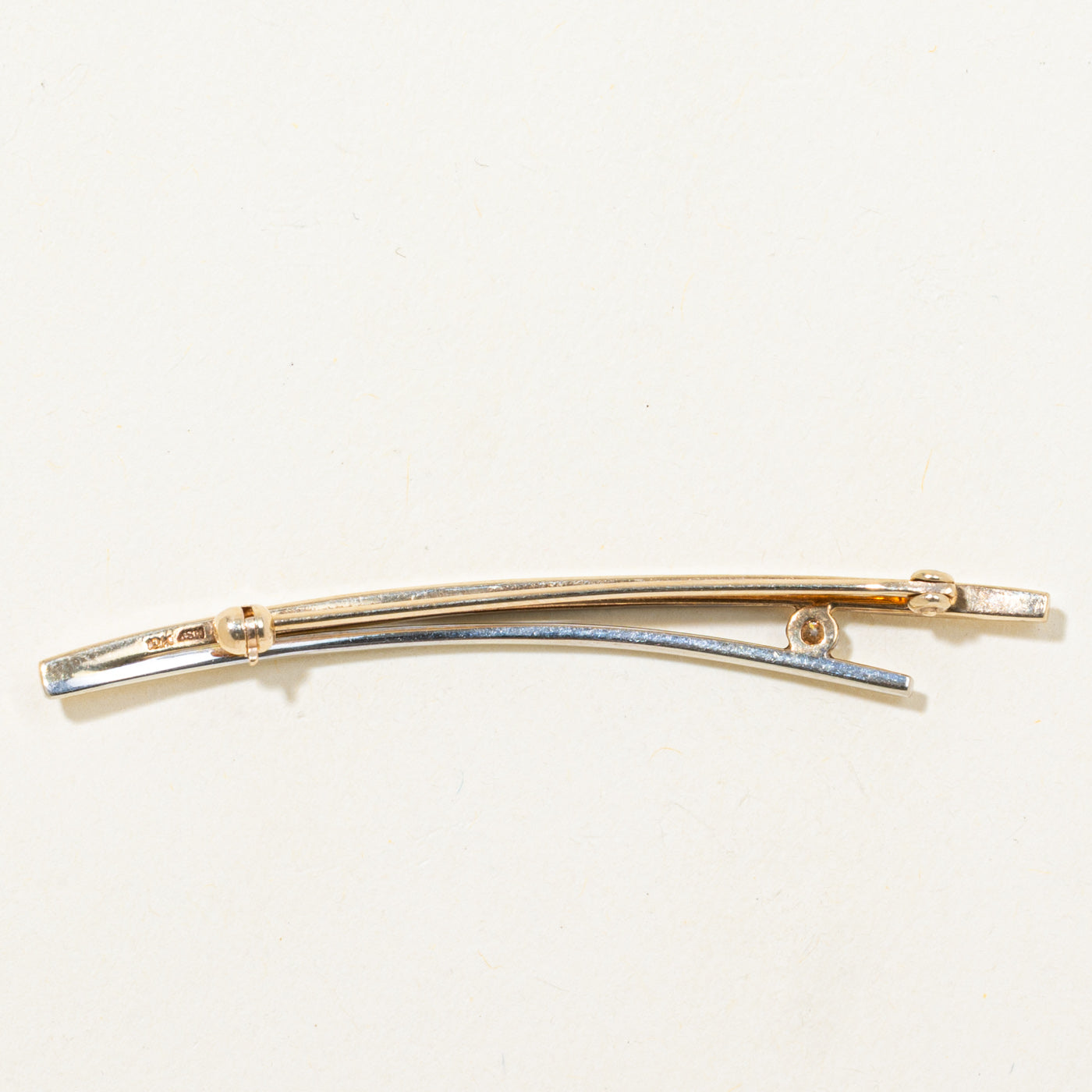 Two Tone Tension Set Diamond Brooch | 0.09ct