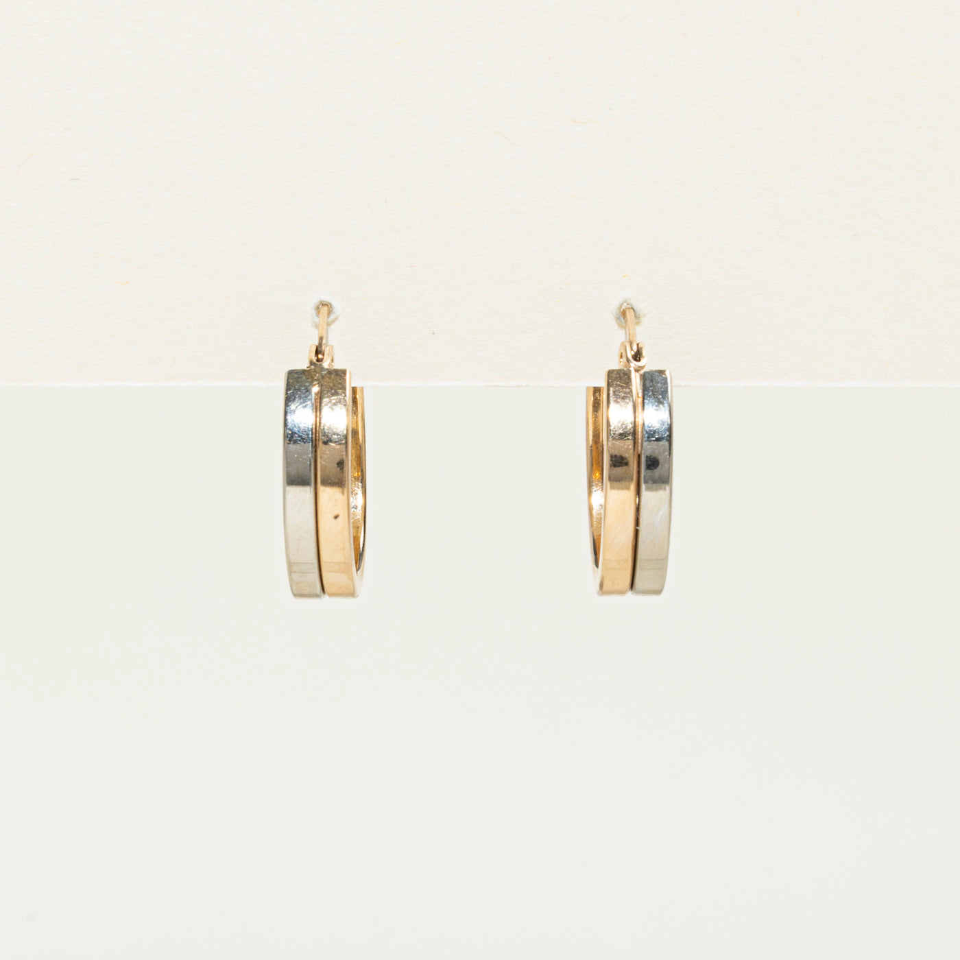 Boucles d'oreilles créoles bicolores en or 10 carats