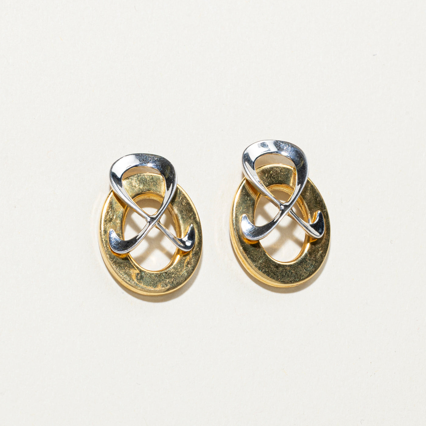 Boucles d'oreilles clous géométriques bicolores en or 18 carats