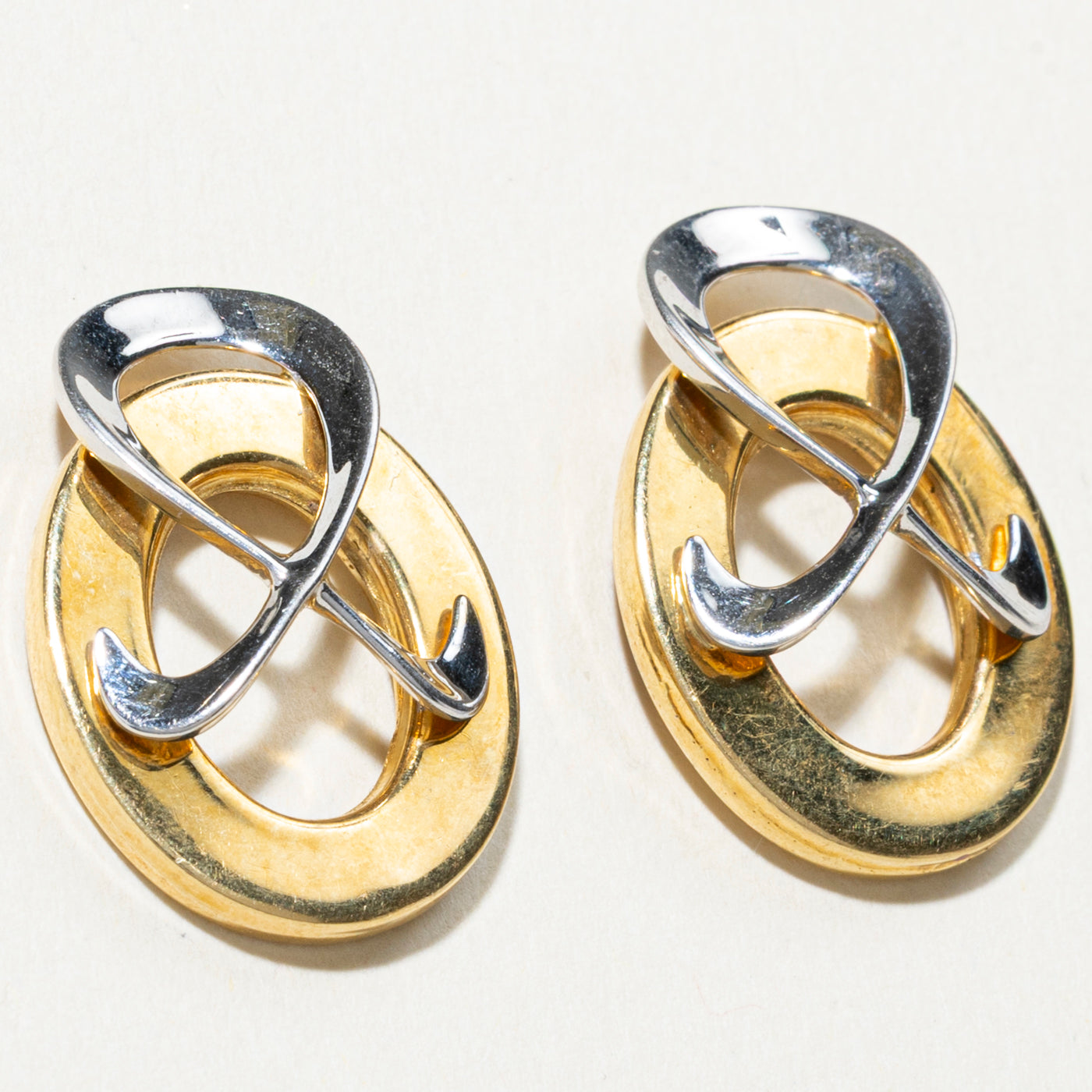 Boucles d'oreilles clous géométriques bicolores en or 18 carats