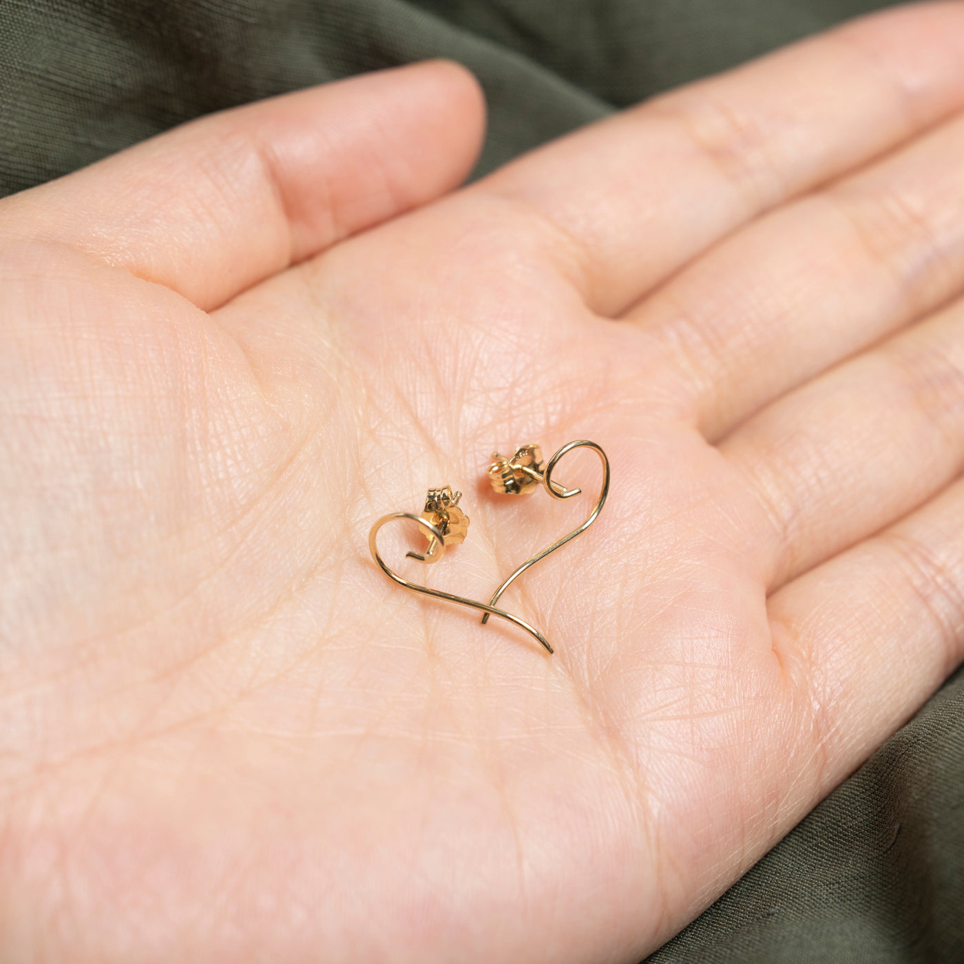 Boucles d'oreilles pendantes tourbillonnantes en or 14 carats