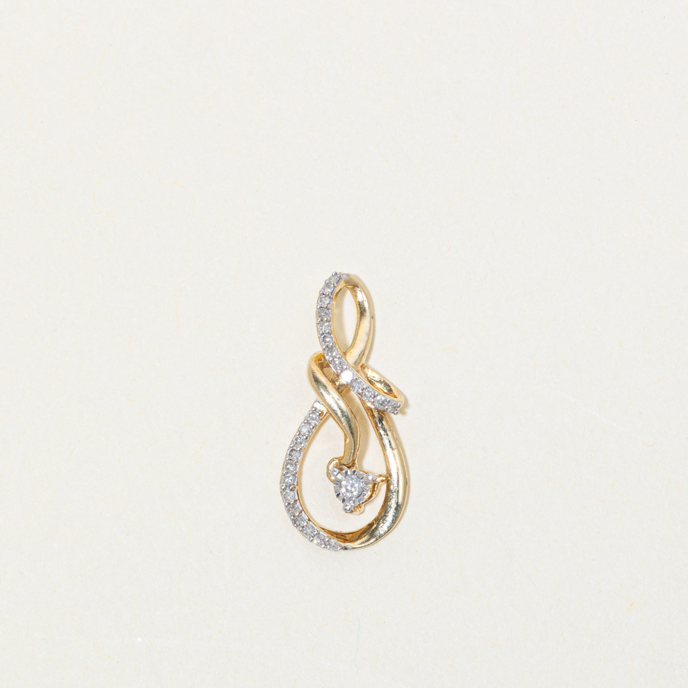 10k Diamond Infinity Swirl Pendant