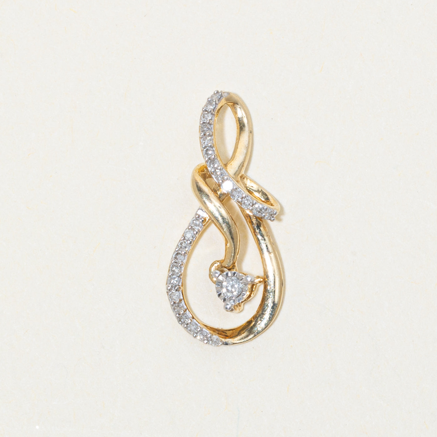 10k Diamond Infinity Swirl Pendant