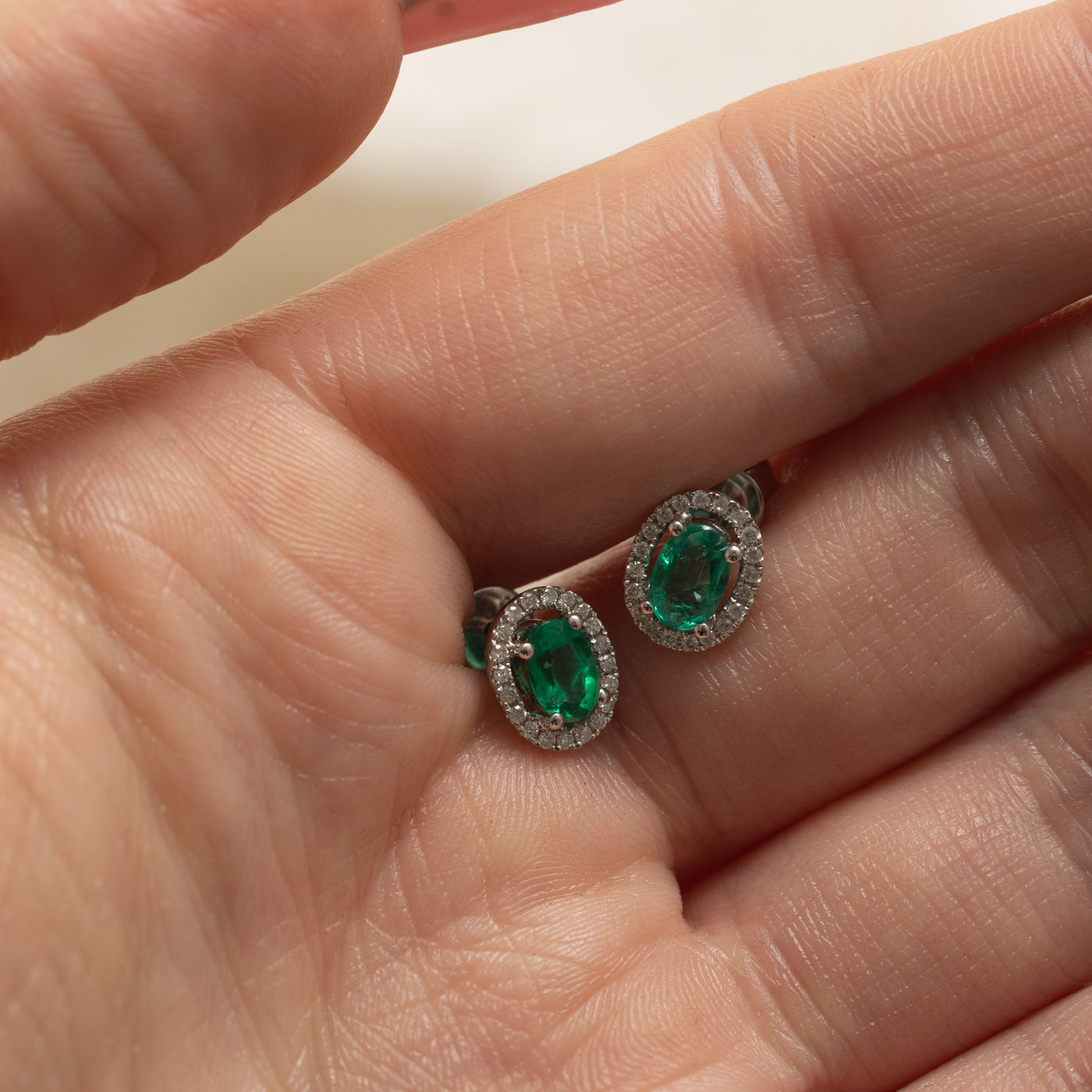 18k Oval Cut Emerald & Diamond Halo Earrings | 0.70ctw, 0.08ctw