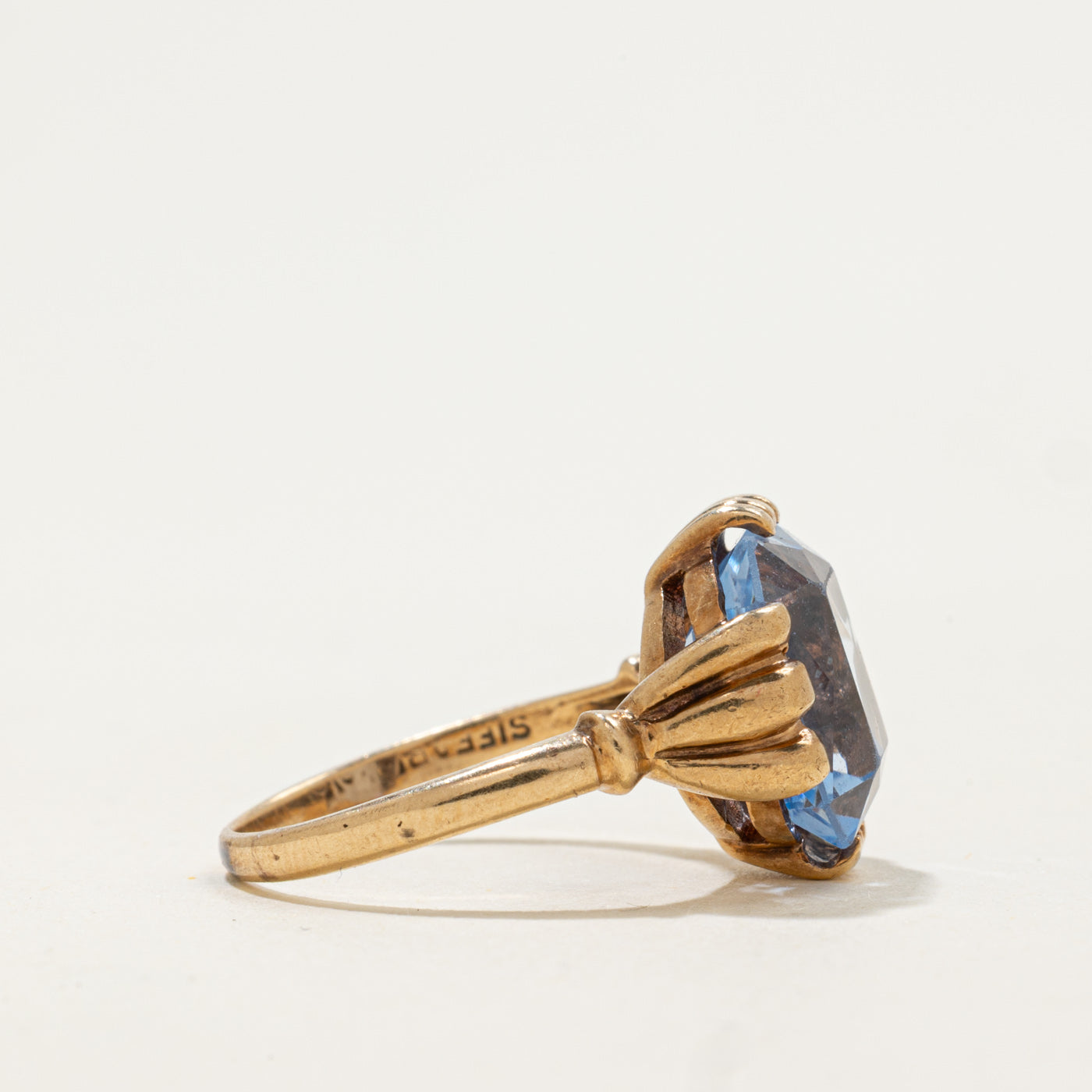 10k Claw Set Scissor Cut Synthetic Blue Spinel Ring | 5.6ct | SZ 7.5